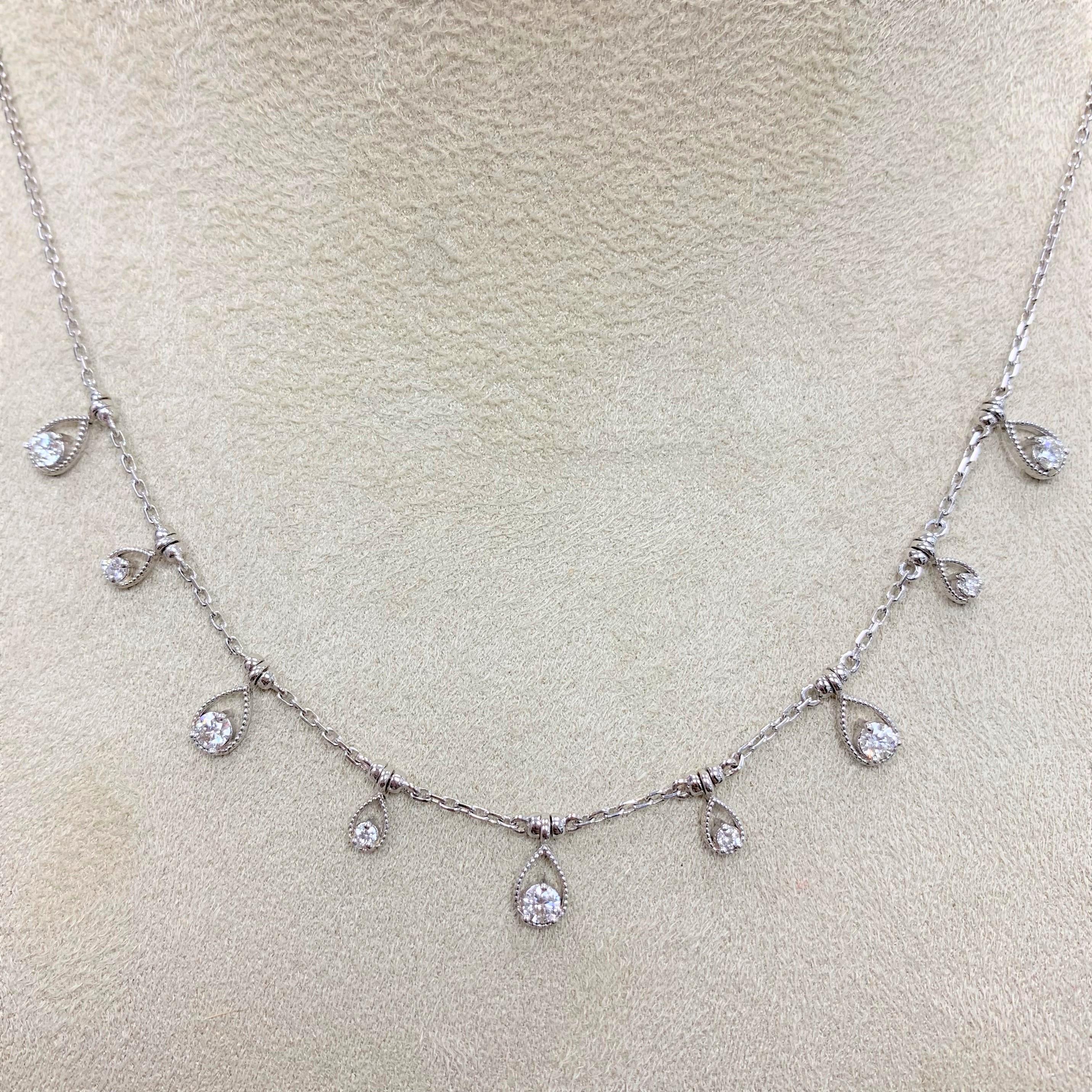 Fun & Chic this necklace is full of life and character. It is great of daily stylish wear or an evening out. In can also be layered with similar styles in Rose & Yellow Gold.

Total Diamond Weight: 0.61 ct 
No. of Diamonds: 9
Diamond Color: G -