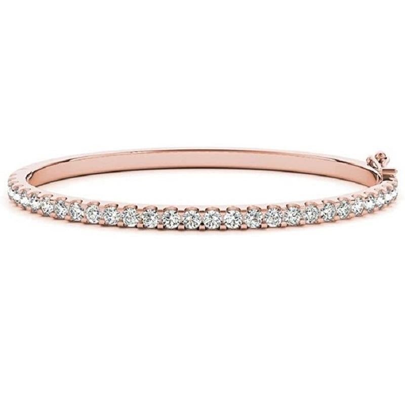 A modern take on the traditional bangle that delicately accentuates the wrist. This bangle is open-able for ease of putting on and taking off.

Total Diamond Weight: 1.60 ct 
No. of Diamonds: 32
Diamond Color: F - G
Diamond Clarity: VVS - VS (Very