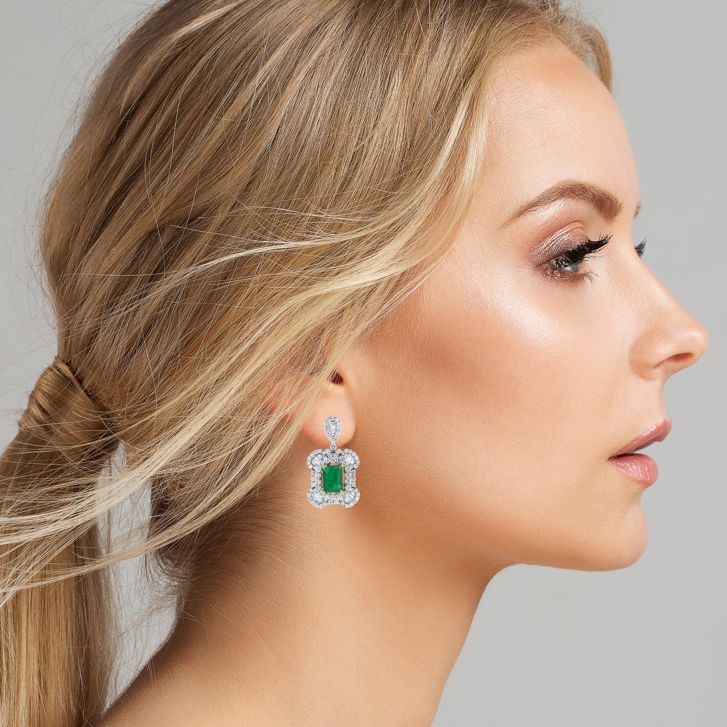 Designed for simplicity & statement, these earrings are a timeless and creative pair. 

Gemstones Type: Emerald 
Gemstones Shape: Rectangular 
Gemstones Weight: 3.12 
Gemstones Color: Green 

Diamonds Shape: Round & Baguettes 
Side Diamonds Weight: