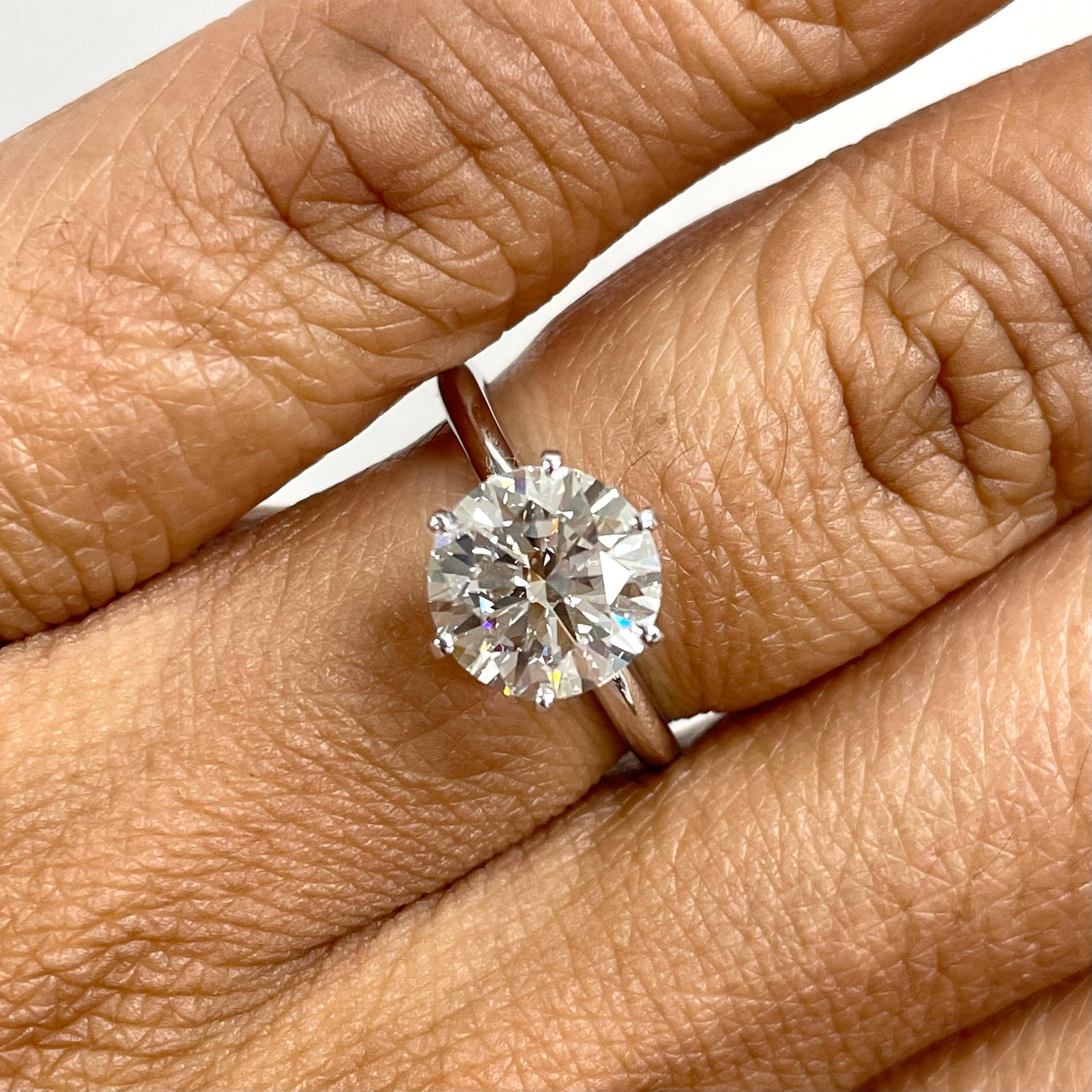 This stunning 2.00 ct H IF GIA certified Round Brilliant Cut Diamond Ring is all the bang for the buck. With measurement similar to that of a 2.25 carat and stunning fire and luster, it is a dazzler.

Center Diamond Shape: Round Brilliant
Center