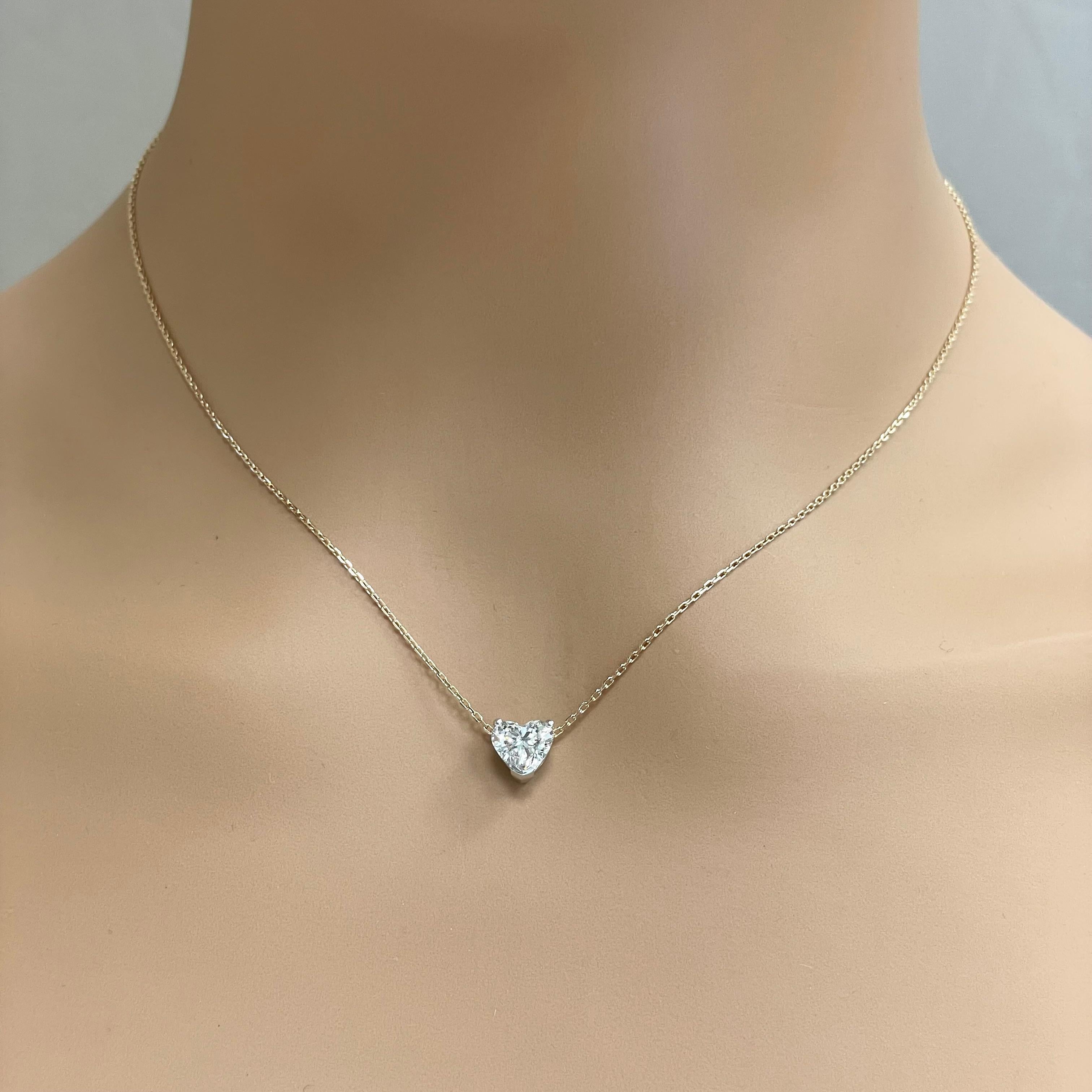 A gorgeous Heart Shaped Diamond Pendant in a white gold setting with rose gold chain. This lovely diamond measures larger than its size to give you that extra bang for your buck.

Center Diamond Shape: Heart Shape
Center Diamond Weight: 1.01 ct