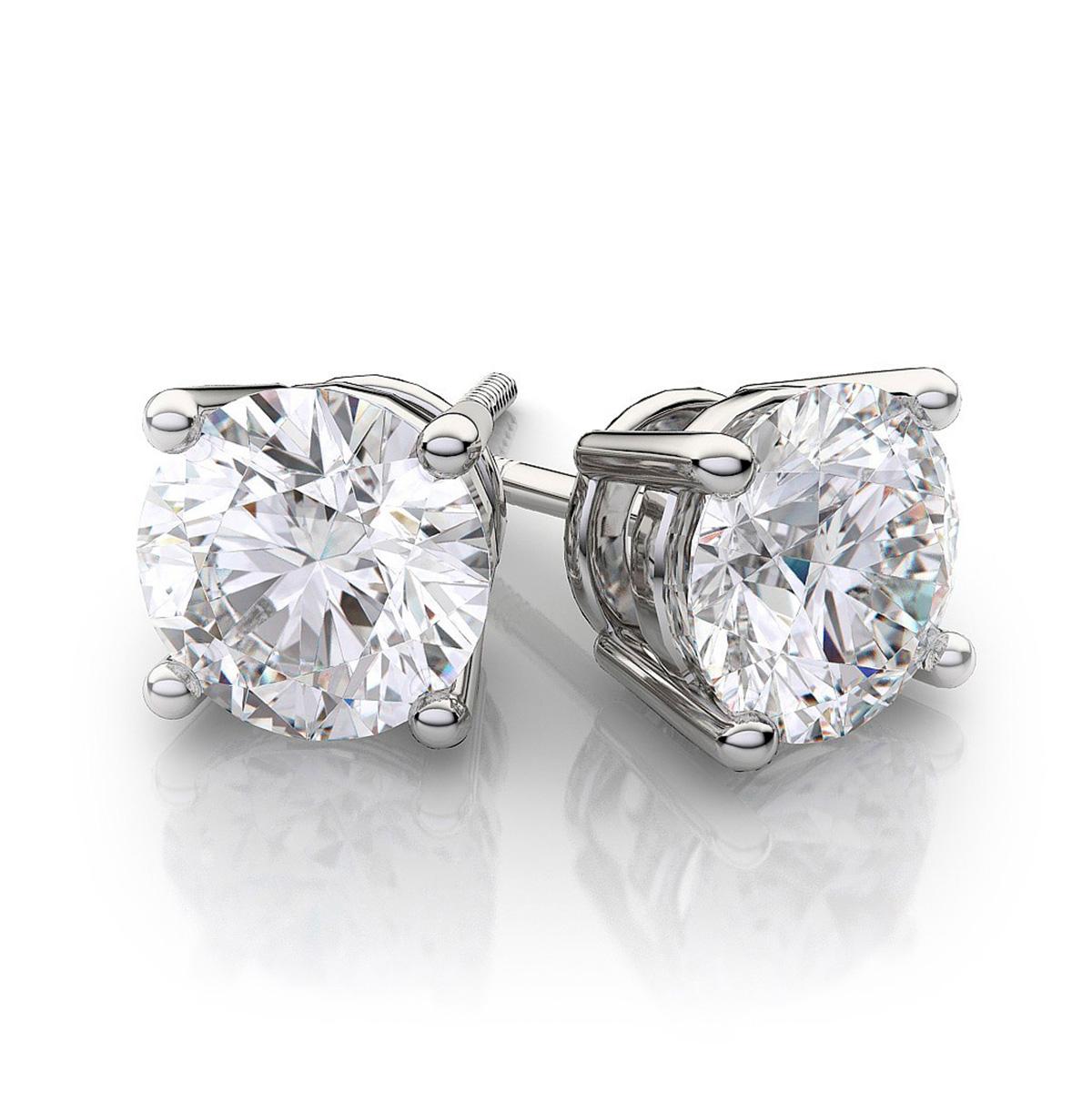 Diamond Solitaire Studs are a signature everyday piece of jewelry. They are a classic and a statement simultaneously. With measurements of 6.4 mm, these diamonds appear larger than most diamonds of similar size while maintaining their excellent fire