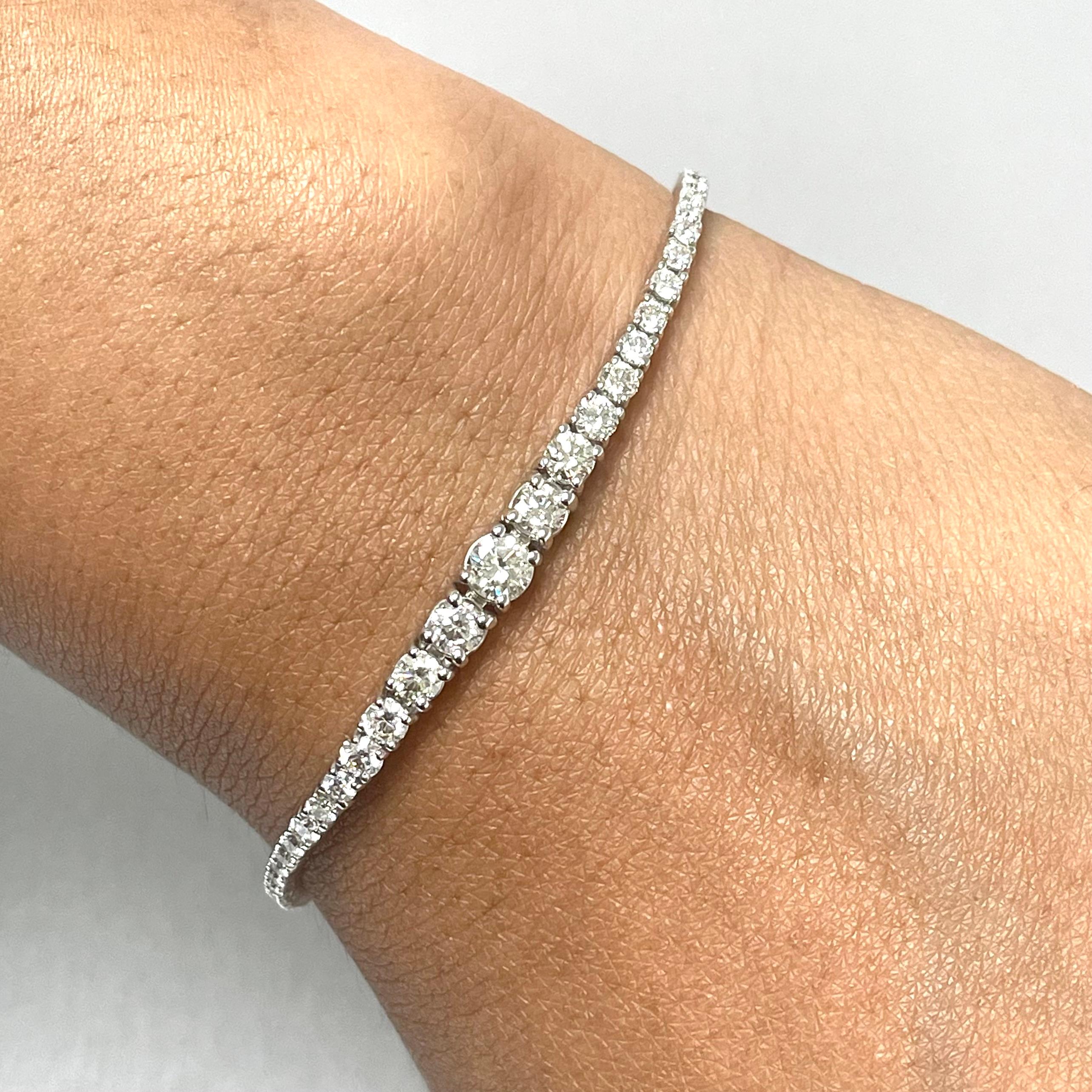 Always a fun accessory, the Bolo bracelet adds sparkles and shine to every look.

Diamonds Shape: Round
Total Diamond Weight: 2.70 ct 
No. of Diamonds: 61 
Diamond Color: H - I 
Diamond Clarity: VVS - VS (Very Very Slightly Included - Very Slightly
