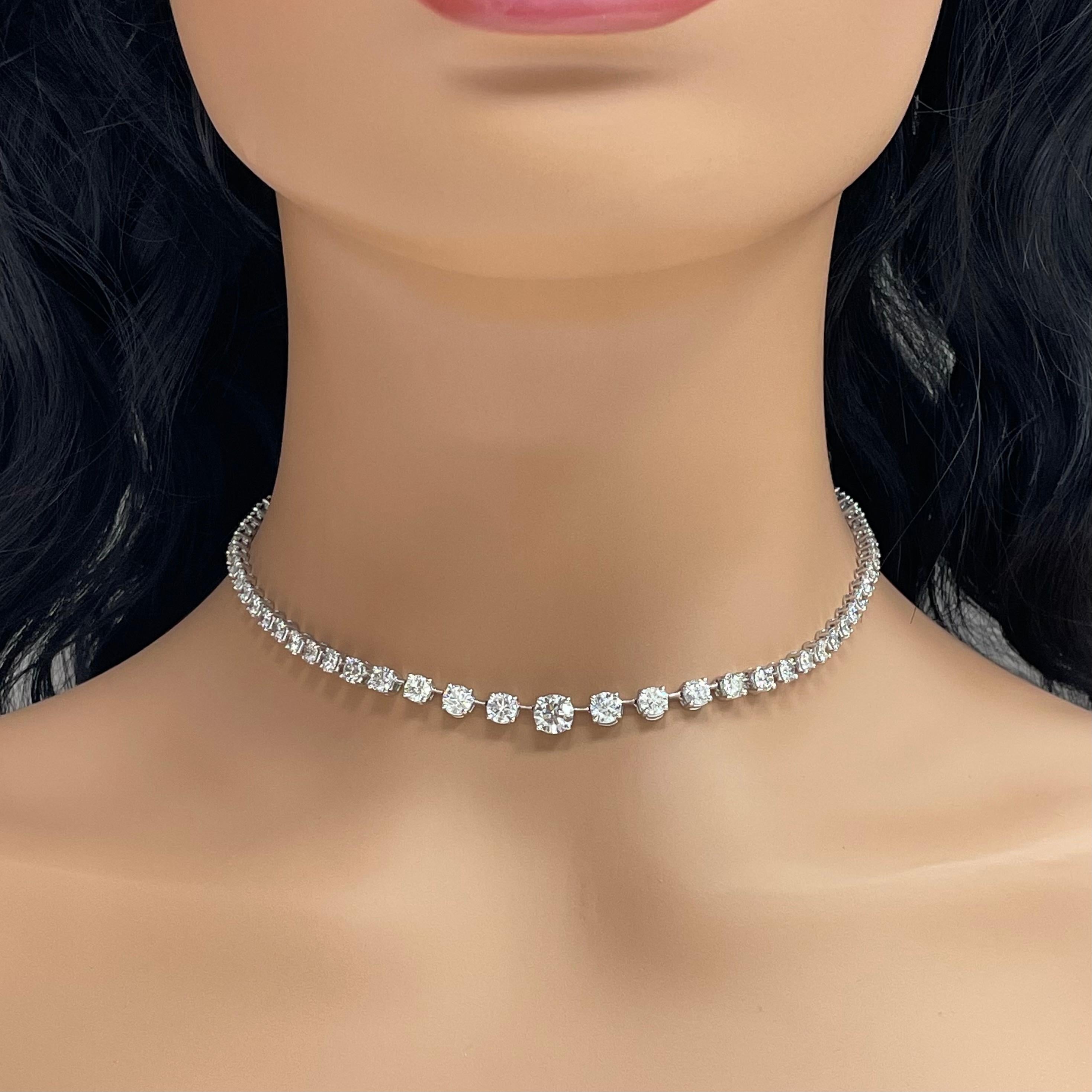 A classic and elegant everyday or occasional wear with graduating diamond sizes, this Space Necklace is a fresh take on a versatile piece of jewelry. All our necklaces have two locks for added security. 

Center Diamond Weight: 1.00 ct 
Center