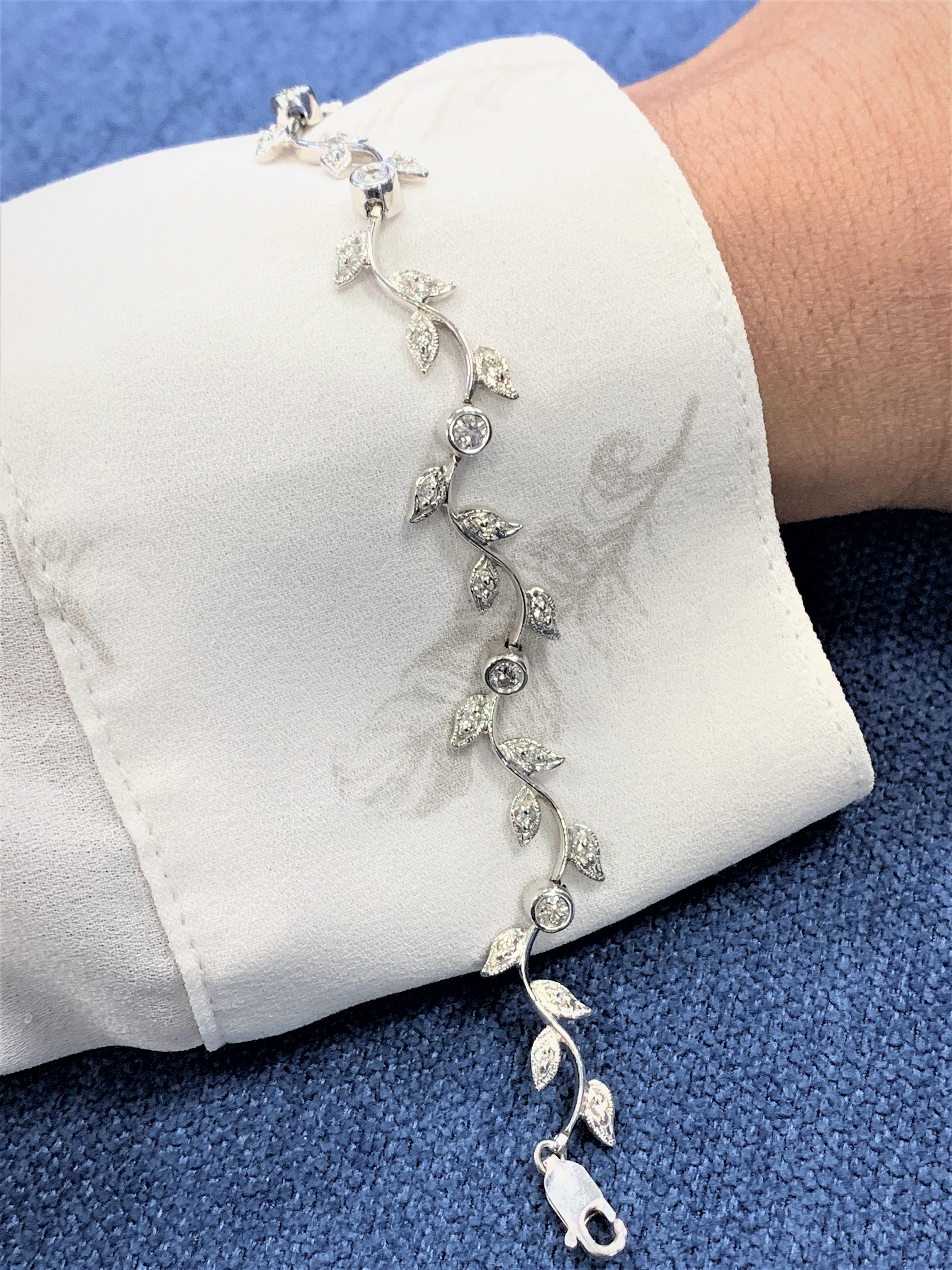 The Grape Vine Diamond Bracelet is a delicate accessory that reflects a touch of nature.

Total Diamond Weight: 1.09 ct 
Average Diamond Weight: 0.03 ct 
Diamond Color: G - H
Diamond Clarity: SI

Metal: 14K White Gold
Metal Wt: 11.88 gms 
Setting: