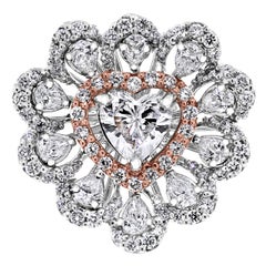 Beauvince Bague cocktail solitaire en or rose et blanc avec diamants en forme de cœur