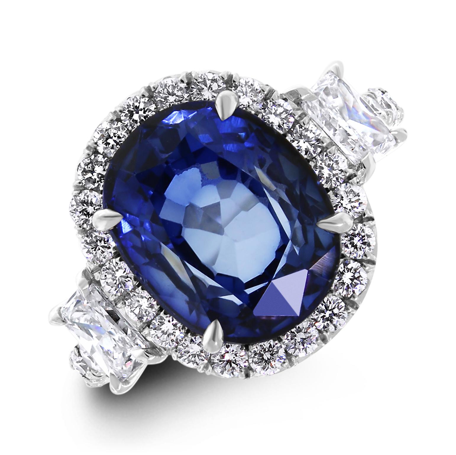 An enviable jewel, this ring sports some dazzling Diamonds & a sparkling Sapphire. 

Gemstones Type: Sapphire 
Gemstones Shape: Oval 
Gemstones Weight: 5.92 ct
Gemstones Color: Blue 

Diamonds Shape: Round & Radiant 
Side Diamonds Weight: 1.75 ct