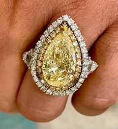 Beauvince Illumina Ring 8.85 Carat Pear Shape Fancy Yellow GIA Diamond