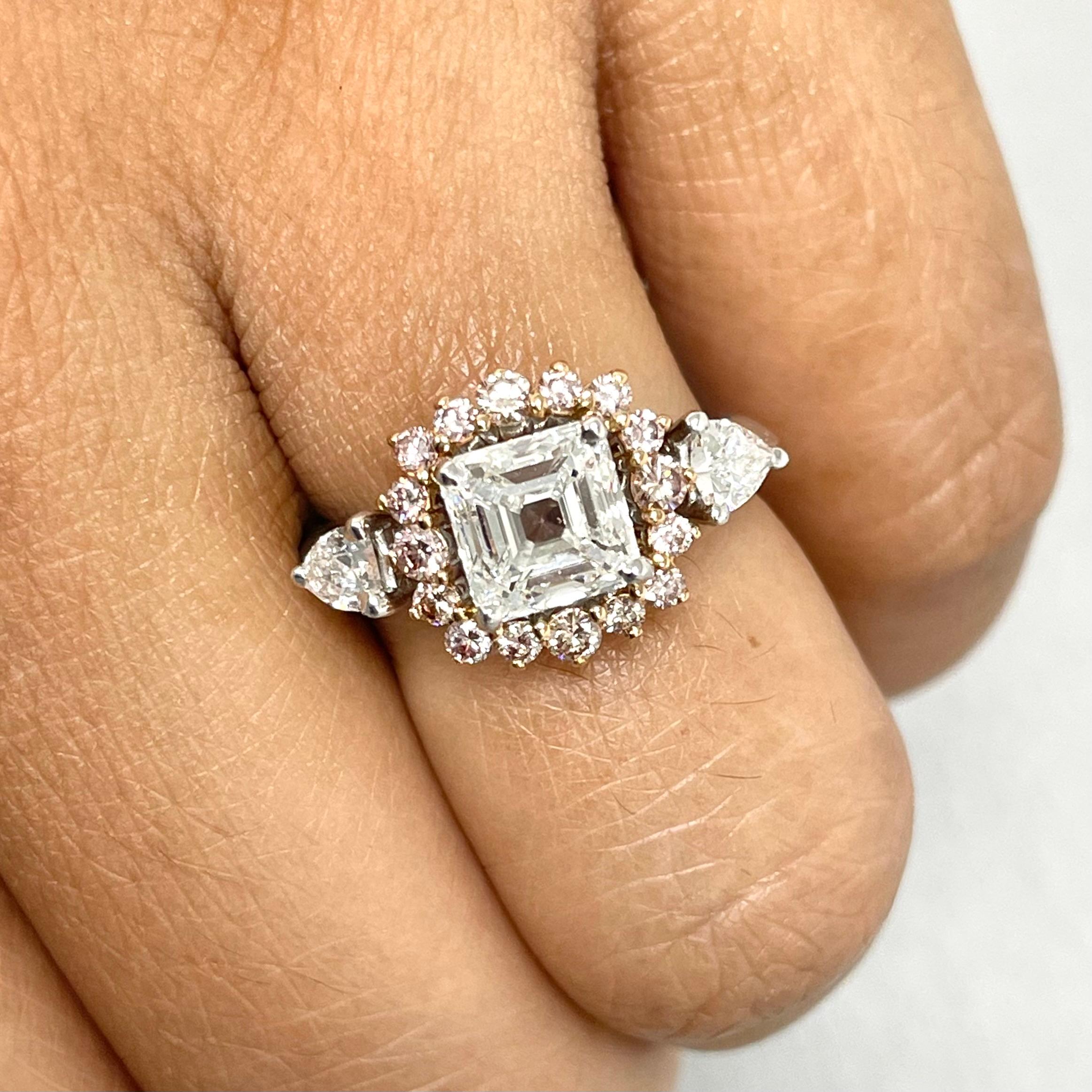 With straight lines of a step cut diamond contrasting the fire of pink round brilliants, the Iraa ring is a class apart. 

Center Diamond Shape: Asscher Cut / Square Emerald
Center Diamond Weight: 1.70
Center Diamond Color: H
Diamond Clarity: VVS1