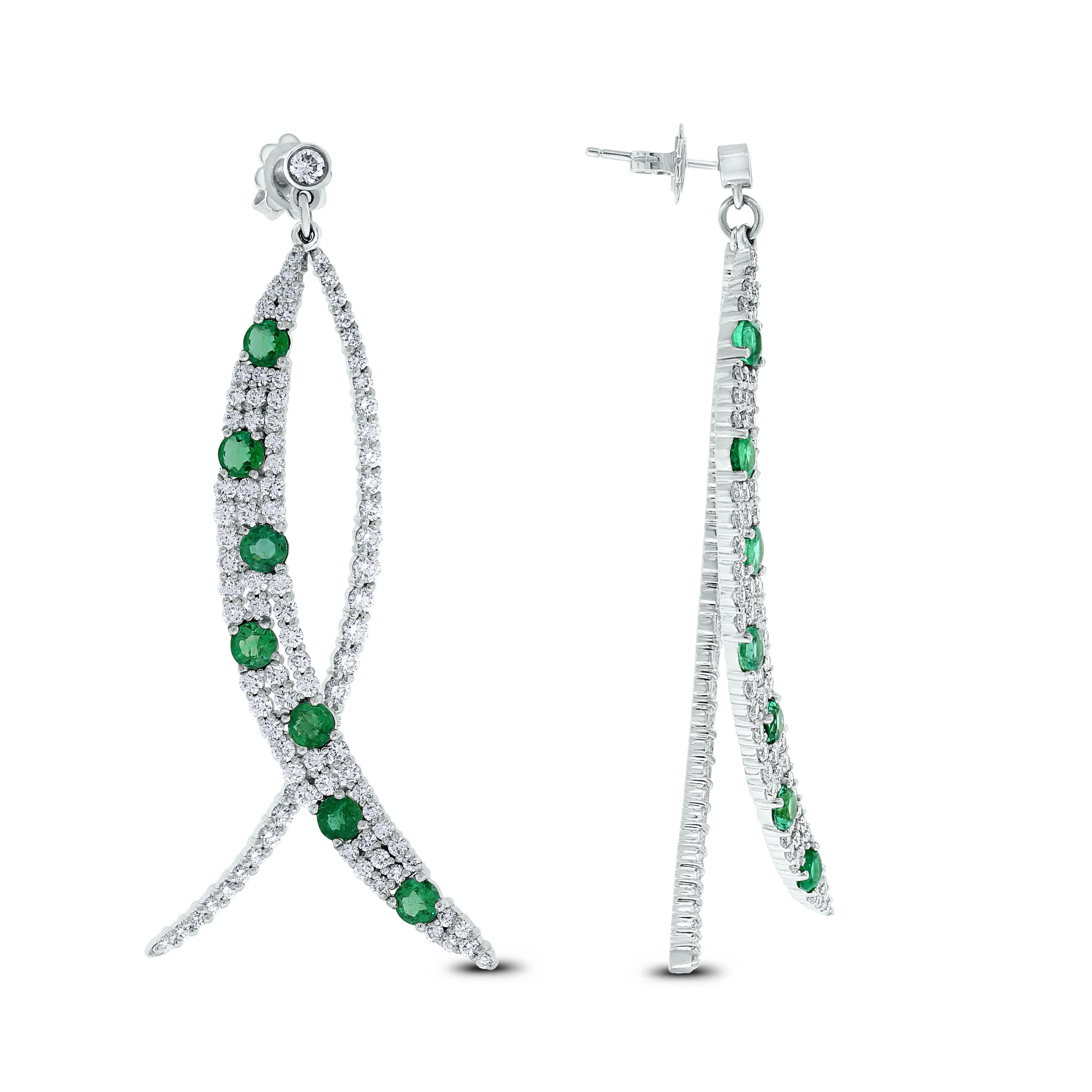 The Beauvince Olive dangling earrings are everything long, slender and chic. With glamorous diamonds and emeralds, they are full of fun and frolic. 

Gemstones Type: Emeralds 
Gemstones Shape: Round 
Gemstones Weight: 3.07 
Gemstones Color: Green