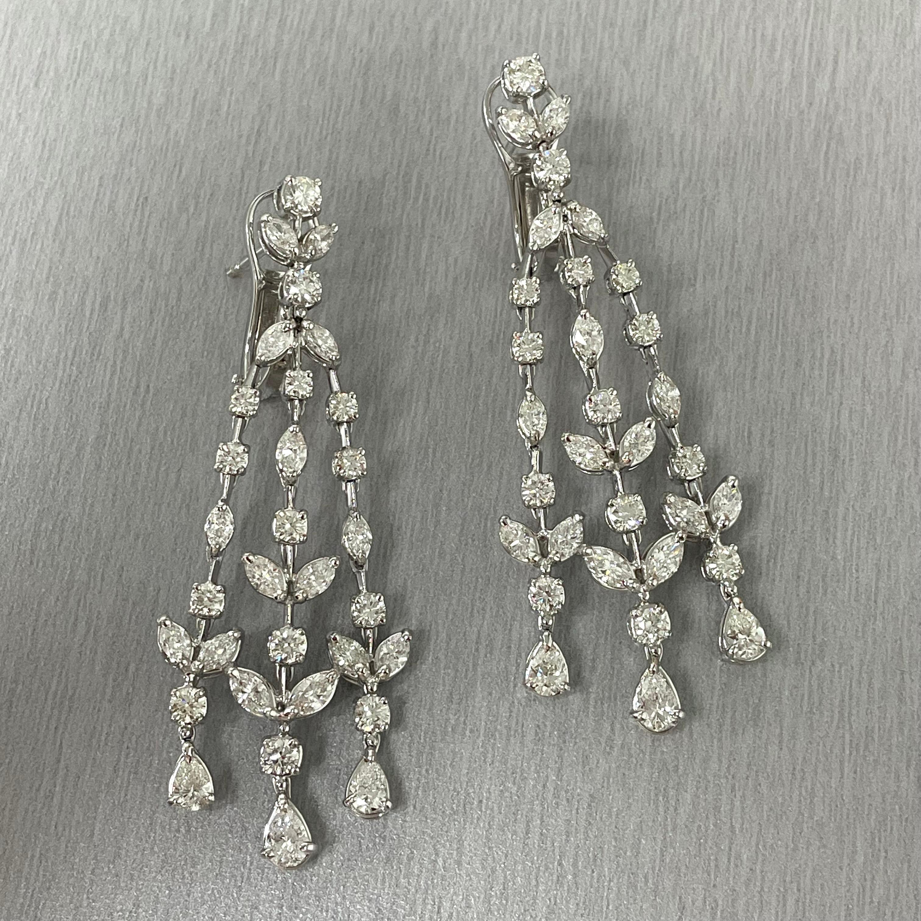 The Beauvince Garden of Eden Earrings feature a timeless design befitting a princess. They are modern, classic, royal & elegant. 

Diamonds Shapes: Pear Shape, Marquise & Round 
Total Diamonds Weight: 7.71 ct 
Diamonds Color: F - H 
Diamonds