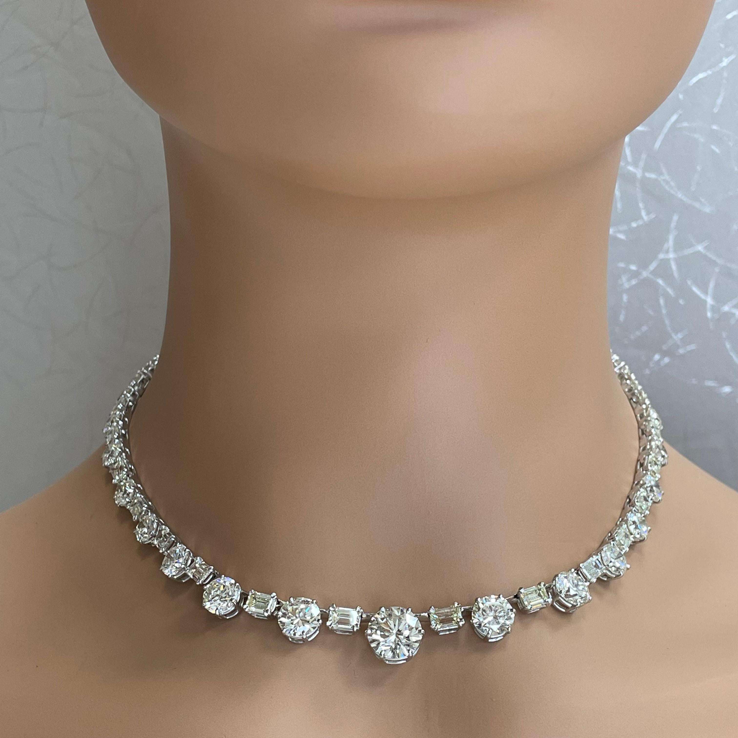 A jewel for generations, this stunning diamond necklace is designed to take your breath away. With minimal white gold showcasing fine solitaire diamonds with the largest being a 4 ct round diamond, it is a jewel to covet. 

Center Diamond Shape: