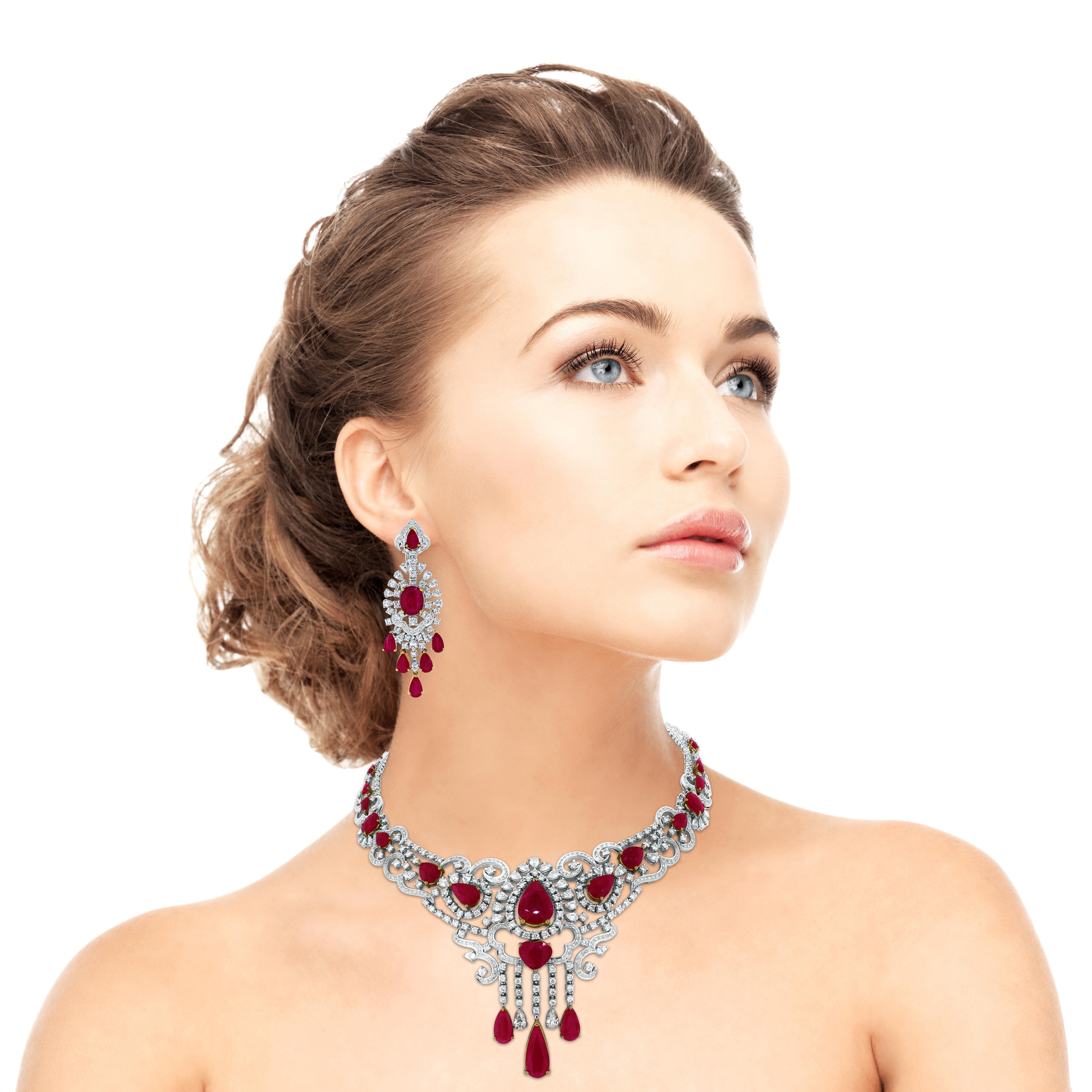 The Beauvince Regalia Ruby & Diamond Suite is a unique and luxurious heritage suite with regal red rubies and diamonds set in gold. 

Gemstones Type: Ruby 
Gemstones Shape: Pear Shape, Oval & Hear Shape 
Gemstones Weight: 39.84 ct (Necklace) & 20.19