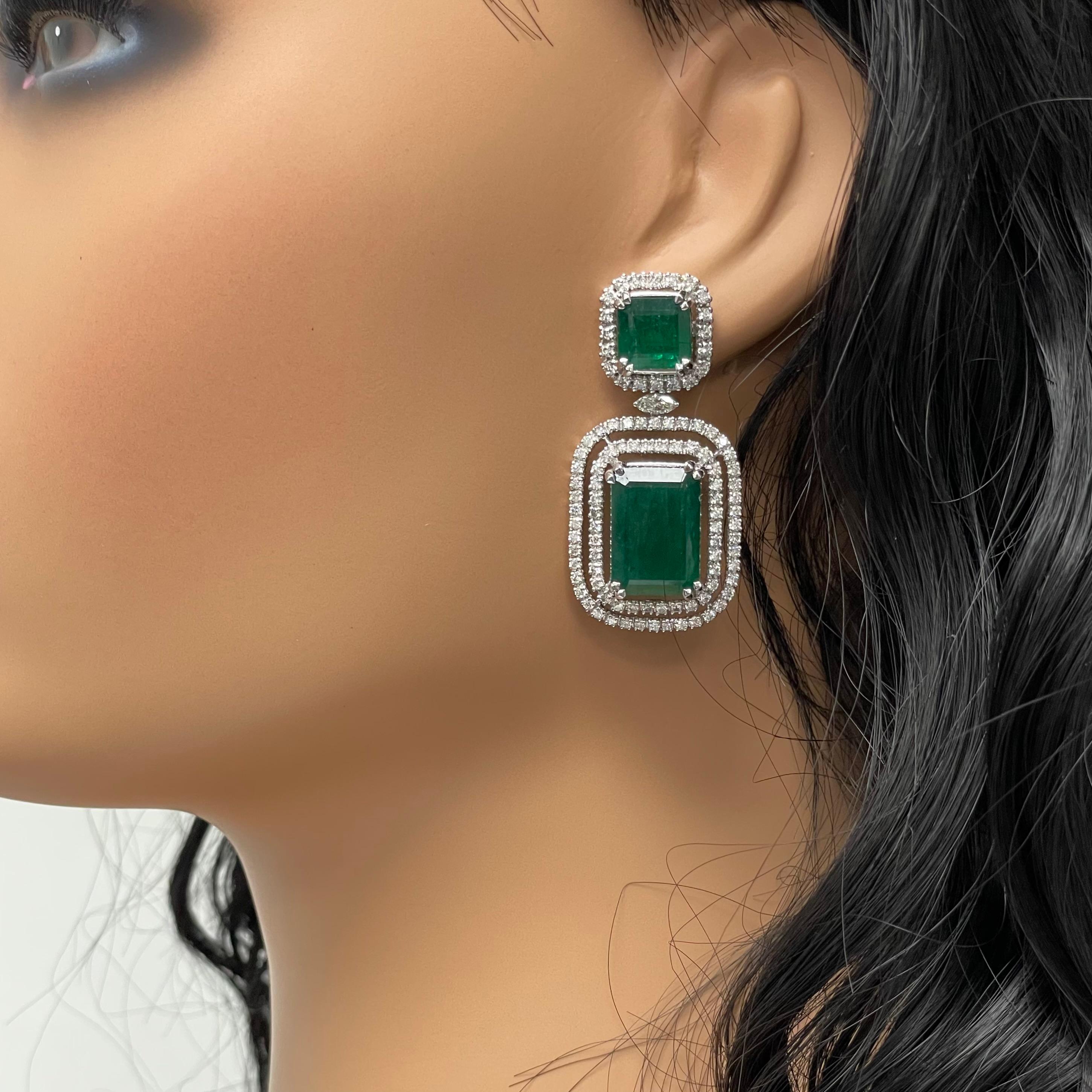 The Renee Emerald & Diamond Earrings are a unique and luxurious heritage pair with royal green emeralds and diamonds set in white gold. 

Gemstones Type: Emerald
Gemstones Shape: Rectangular
Gemstones Weight: 25.01 ct
Gemstones Color: