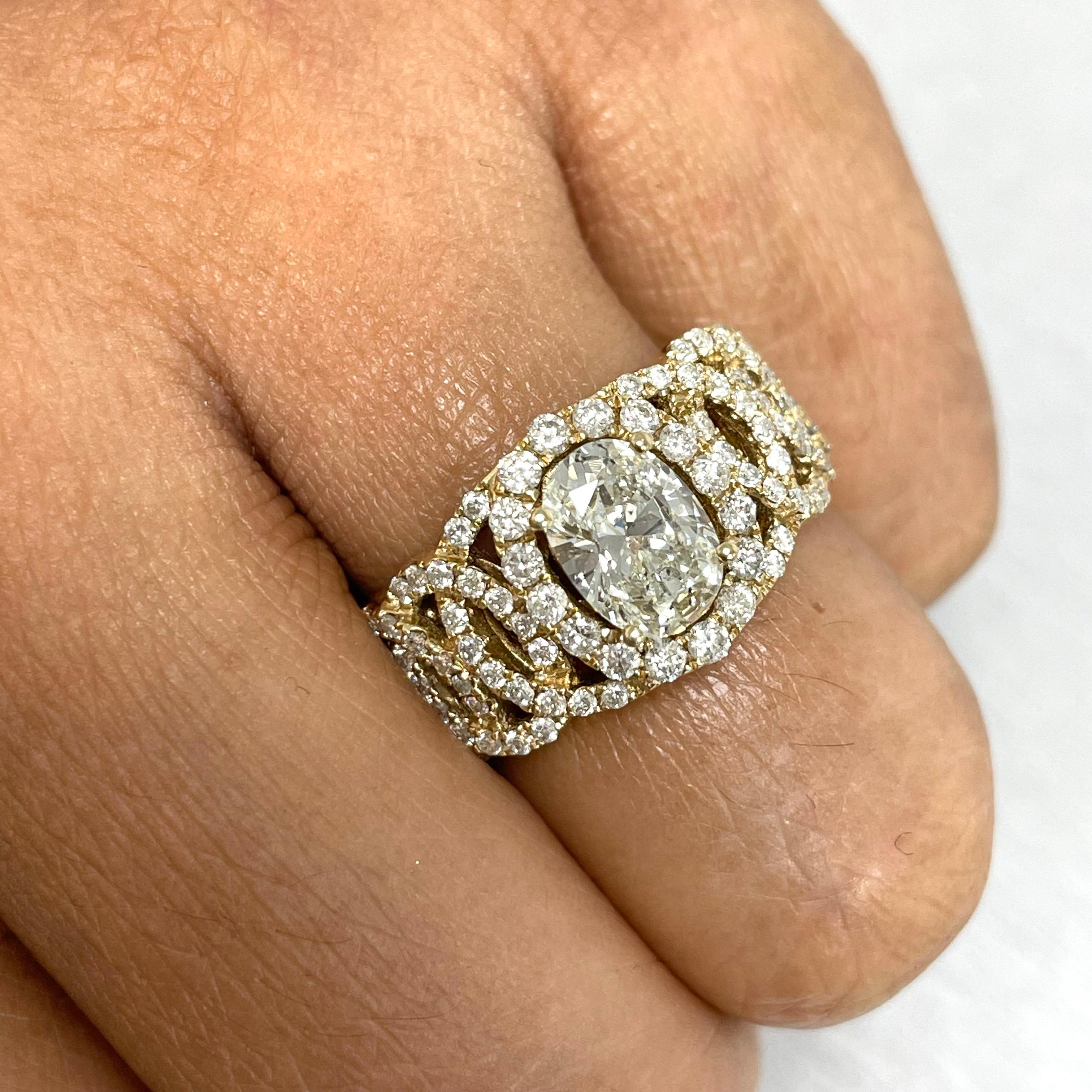 The Ripples engagement ring is one of a kind engagement or statement solitaire ring featuring bold rippling halo details on the shank. This unique ring exudes style and chic whether worn for an occasion or casually. 

Center Diamond Shape: