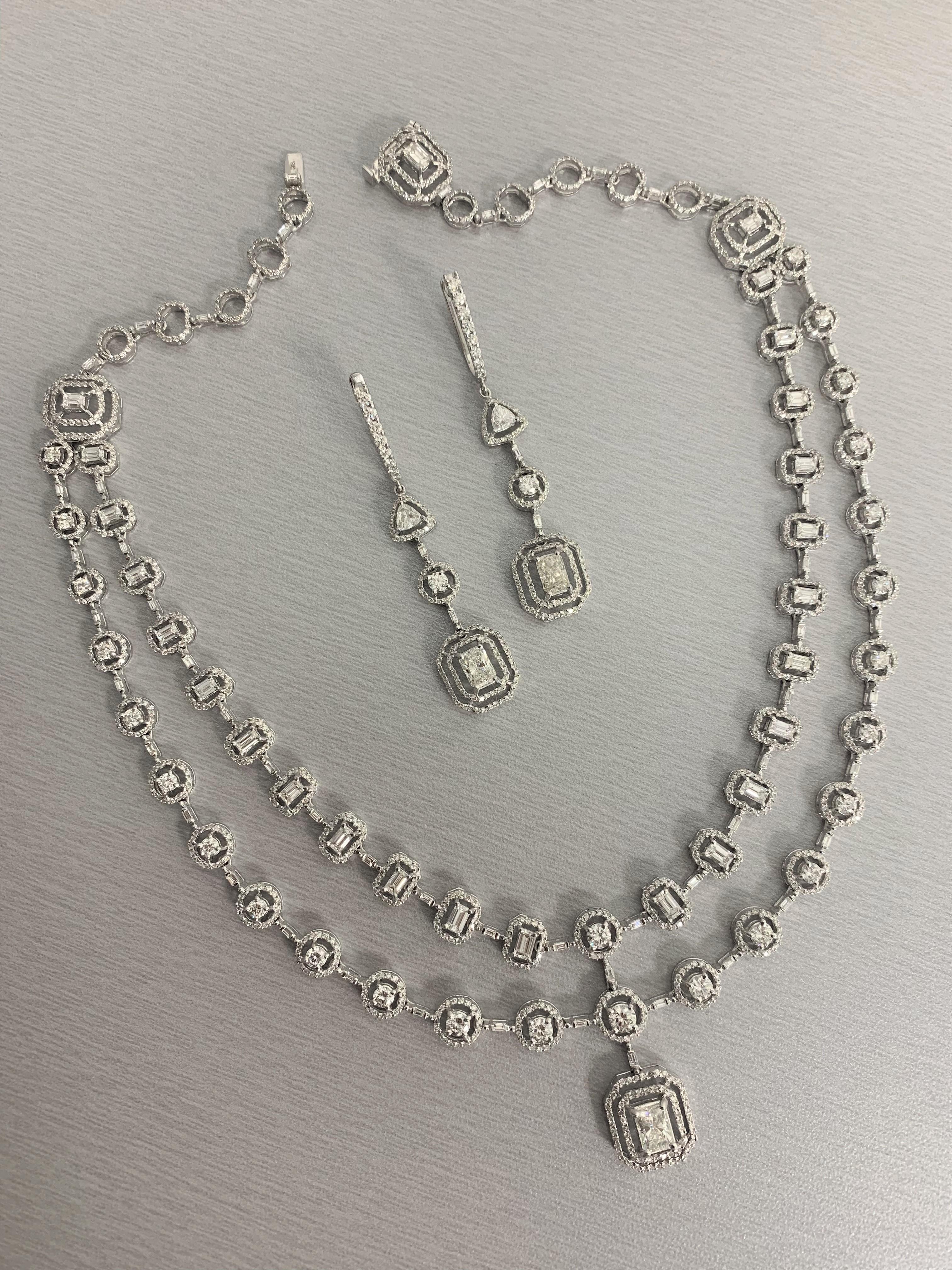 white gold diamond necklace and earrings