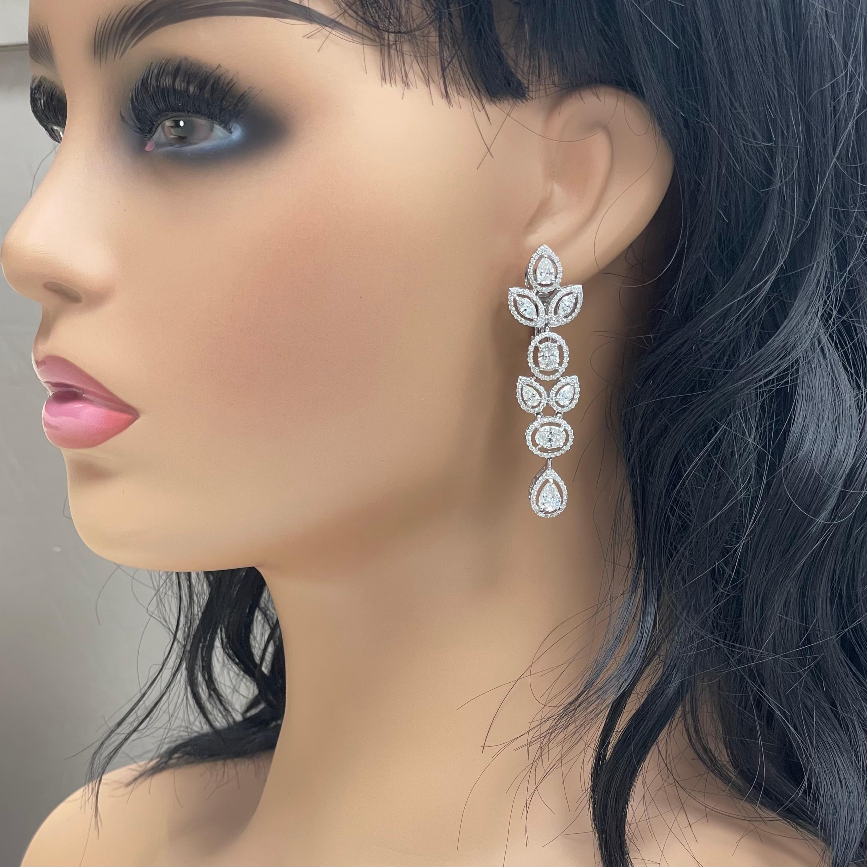 The Tara Earrings feature a elegant timeless design that highlights each diamond and impresses with its simple yet stated style. They are bold and attention grasping.

Diamonds Shapes: Pear Shape, Oval & Marquise
Total Diamonds Weight: 6.59