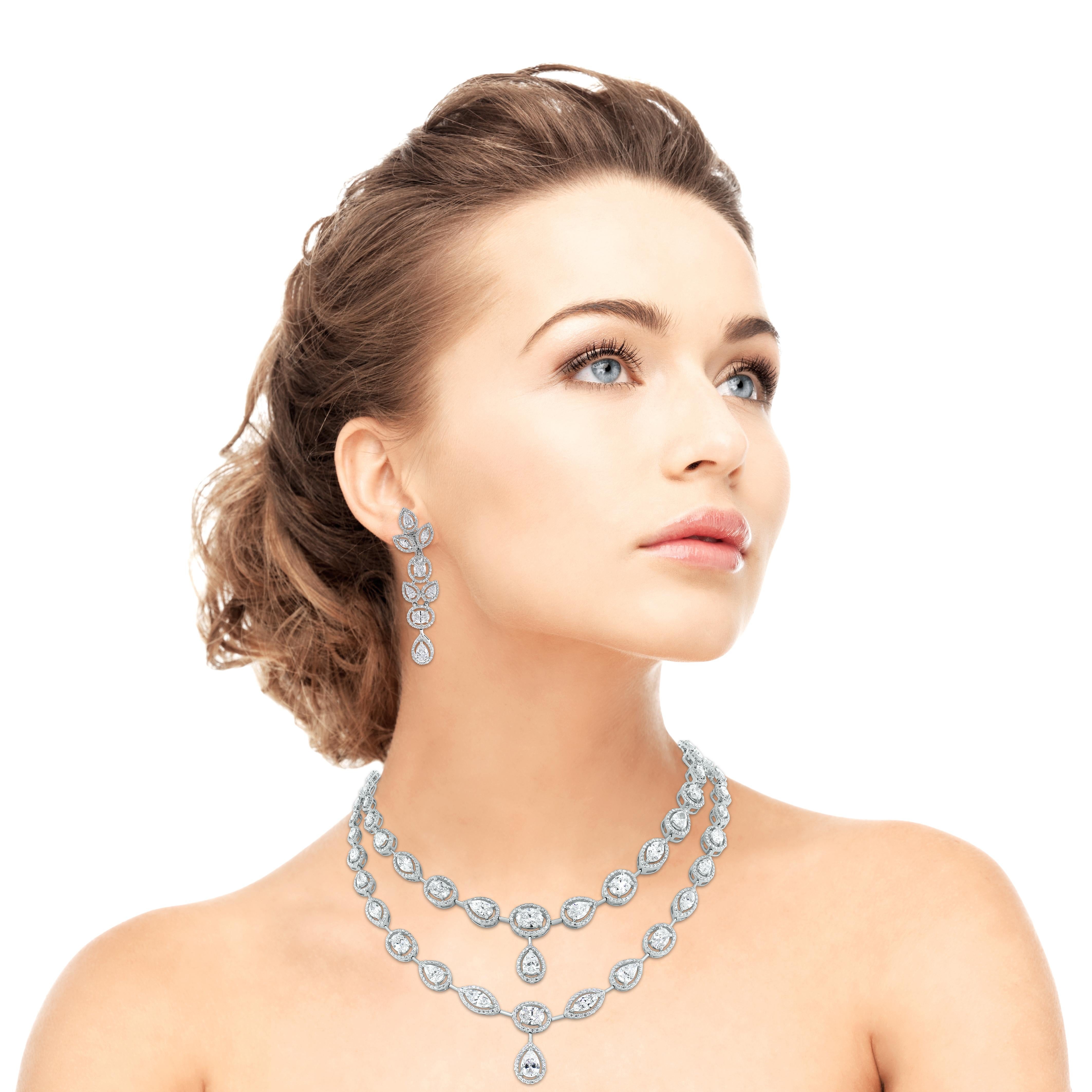 The Tara Necklace & Earrings Suite features a elegant timeless design that highlights each diamond and impresses with its simple yet stated style. Its bold earrings bring attention 

Diamonds Shapes: Pear Shape, Oval, Marquise & Round 
Total