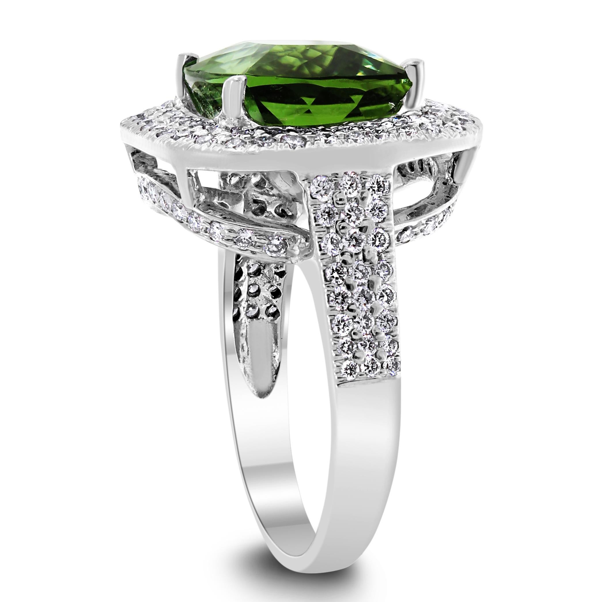 The luxurious colors and charm of this Green Tourmaline are captivating and mesmerizing. The ring is stylish and impressive. 

Gemstones Type: Tourmaline 
Gemstones Shape: Square 
Gemstones Weight: 5.83 ct 
Gemstones Color: Green 

Diamonds Shape: