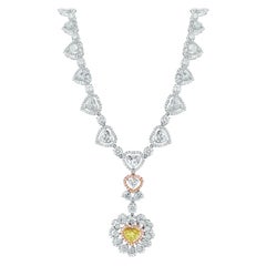 Beauvince Collier pendentif cœur en or blanc et diamants jaunes et blancs