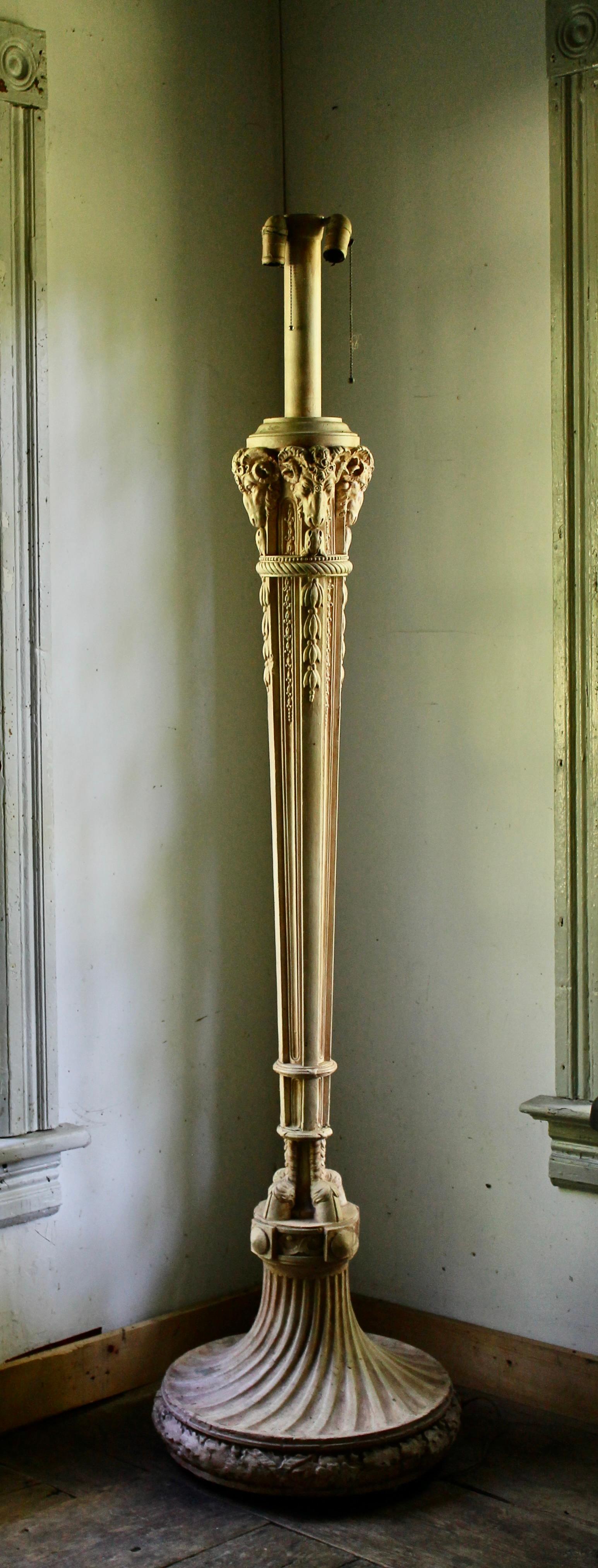 Though wired and used as a lamp, this is a plaster model that a lost wax mold would be taken to cast a large bronze floor lamp for an impressive Beaux Arts interior. Consists of the classic motifs- Ram's heads and hoofs and acanthus details. Wireing