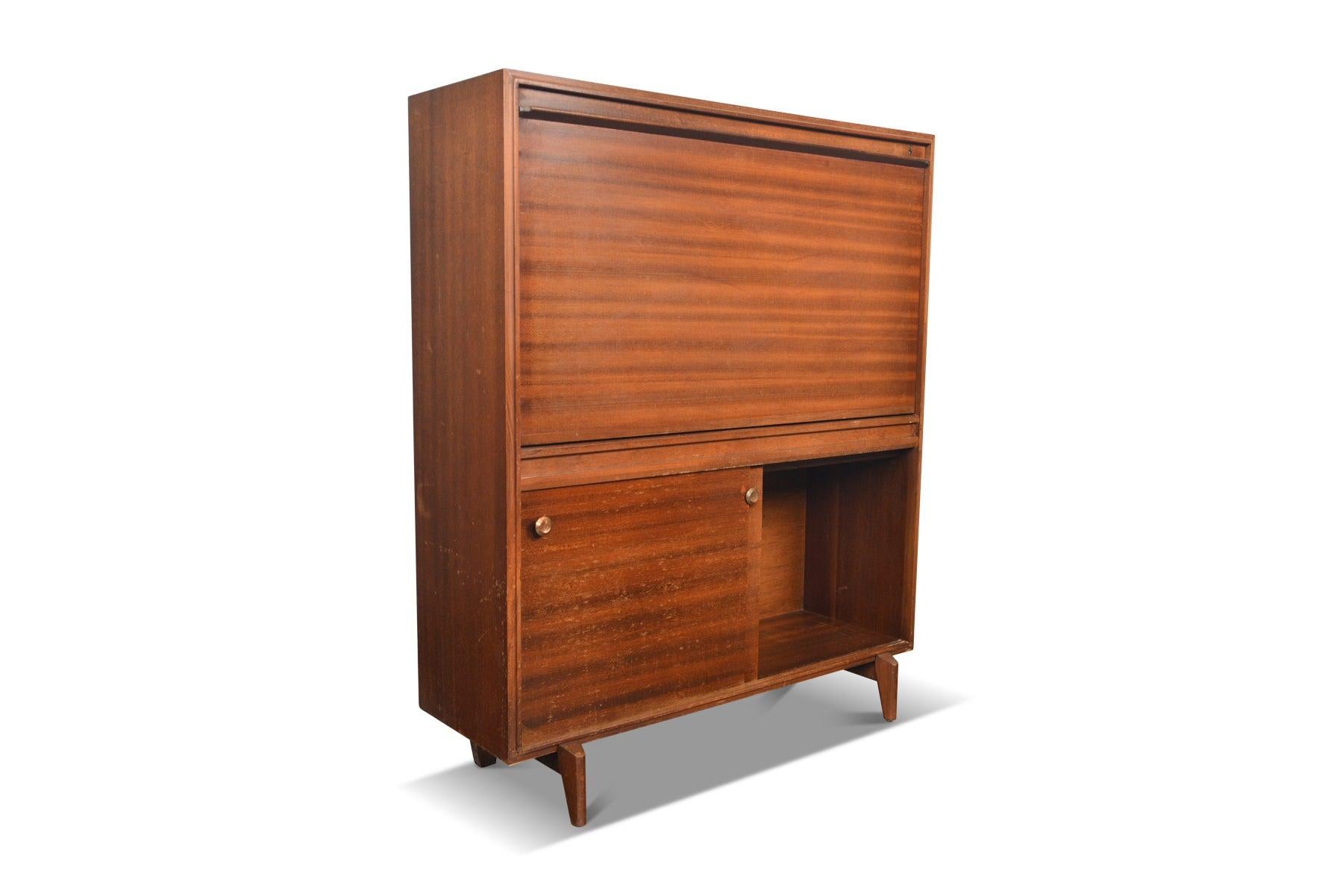 Origin: England
Designer: Unknown
Manufacturer: Beaver + Tapley
Era: 1960s
Materials: Mahogany
Measurements: 33? wide x 11? deep x 40? tall.
Desk: 31.5” wide x 16” deep x 27” tall.

Condition: In excellent original condition with typical