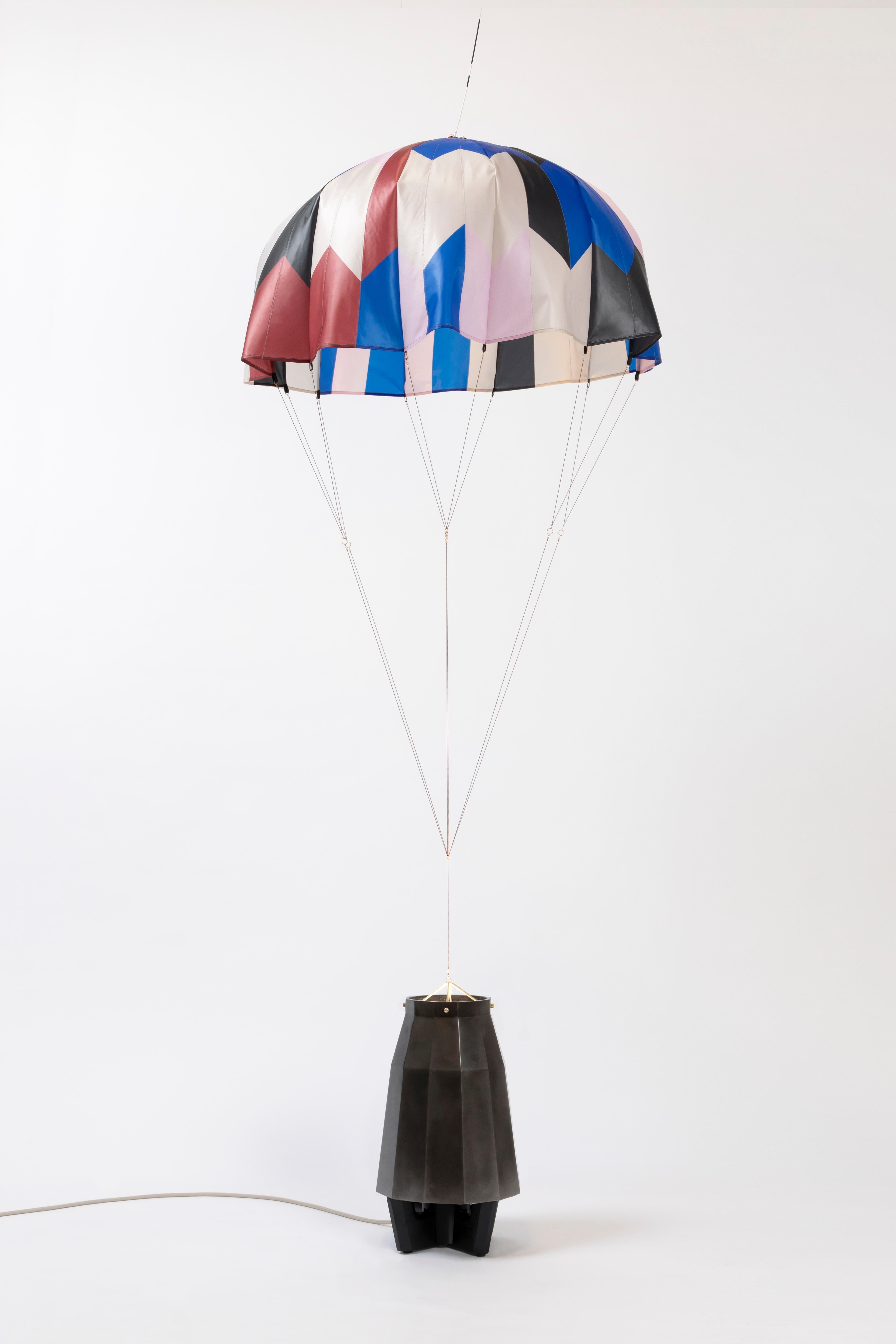 From acclaimed lighting designer Bec Brittain, a new series of dynamic, whimsical lighting forms that mimic the rhythm of flowers in the wind.

Taking cues from the movement of inflated parachutes – specifically, those used by NASA during wind
