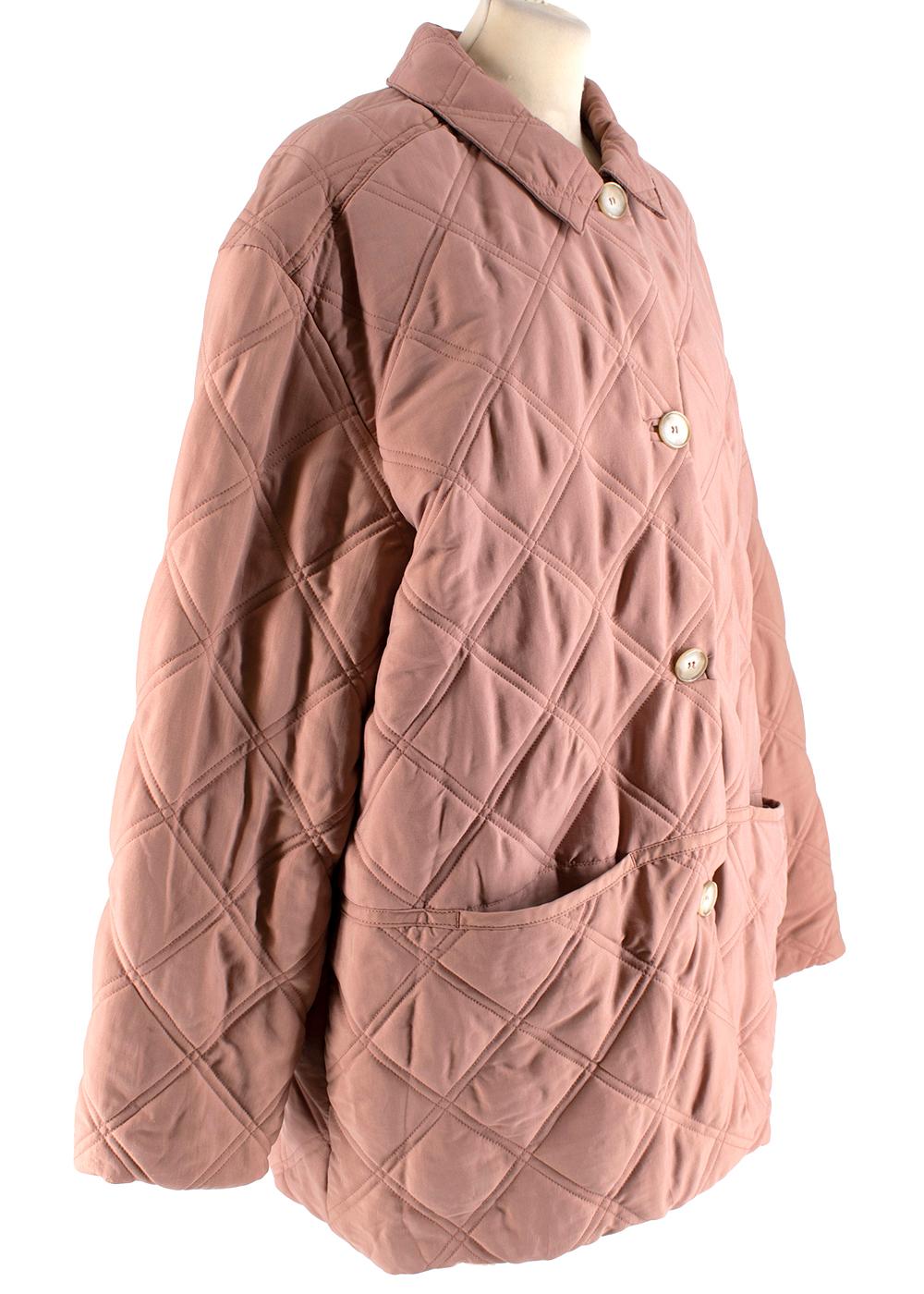 Becken Dusty Pink Oversized Quilted Paddock Jacket

- Dusty pink quilted paddock jacket 
- Oversized style 
- Large front button fastening 
- Pointed spread collar 
- Front patch pockets 
- Fully lined 

Materials: 
Main - 76% Cupro, 24%