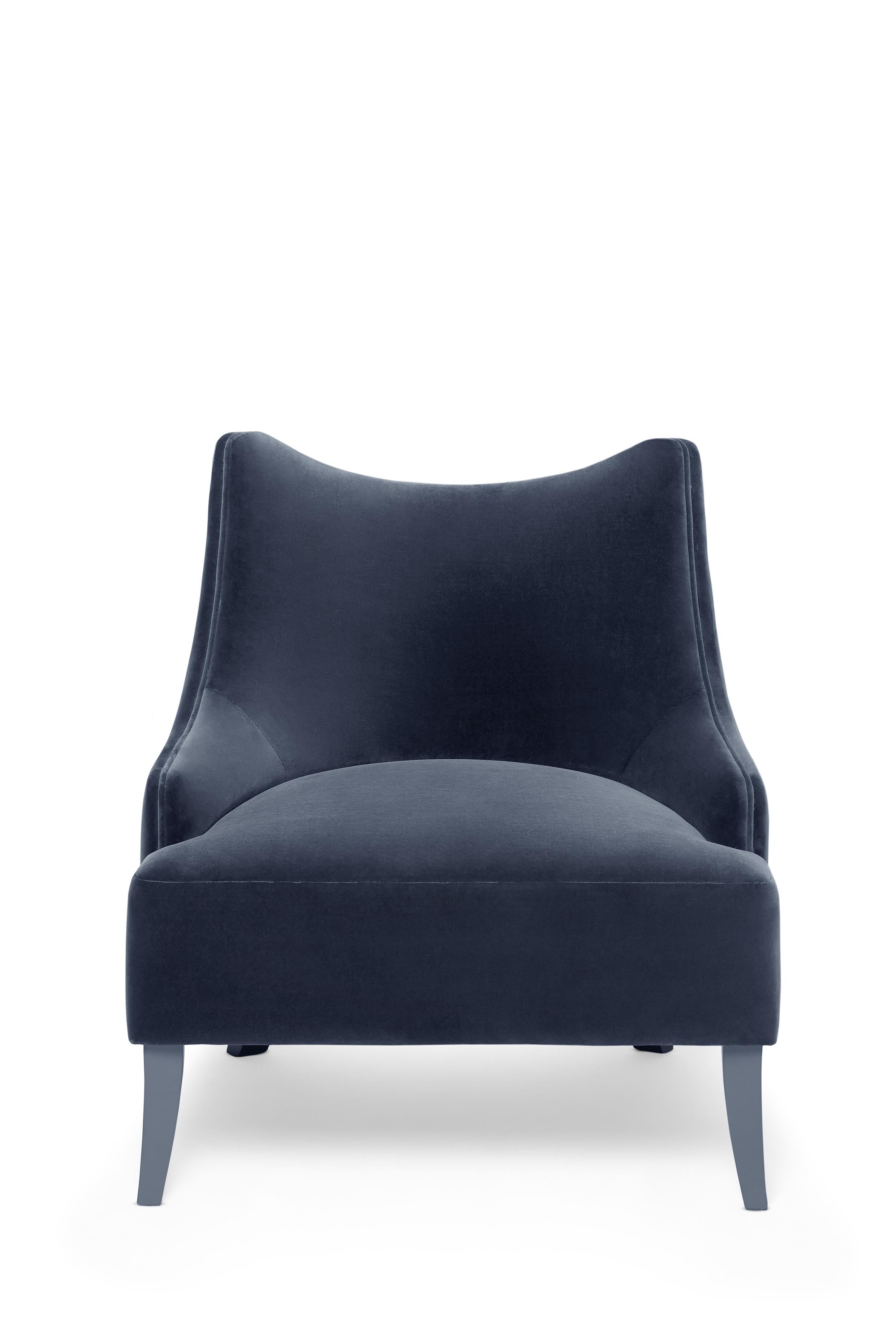 Becomes Me Armchair by Munna
Dimensions: D 75 x W 75 x H 82 cm. SH: 43 cm.
Materials: Wood, foam, and upholstery.
Finish: Cotton Velvet and wood lacquer legs.

Available in all Munna fabrics except Wild Silk. Available in client’s own
material.