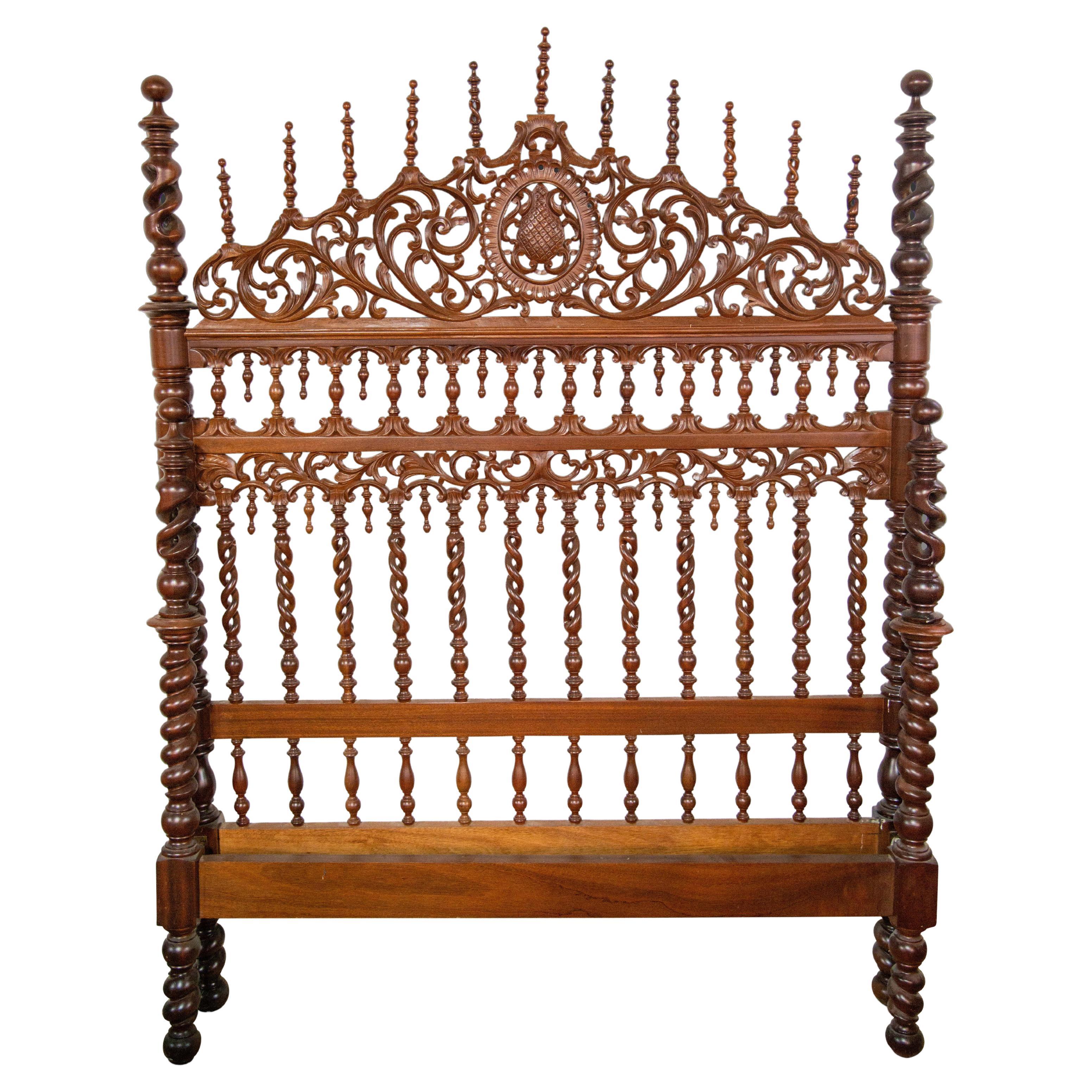 Bed frame. Carved and turned wood. 20th century, following ancient models.