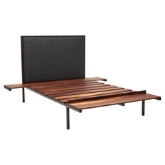 Bed Frame with Wool Headboard and Walnut Side Tables and Bench