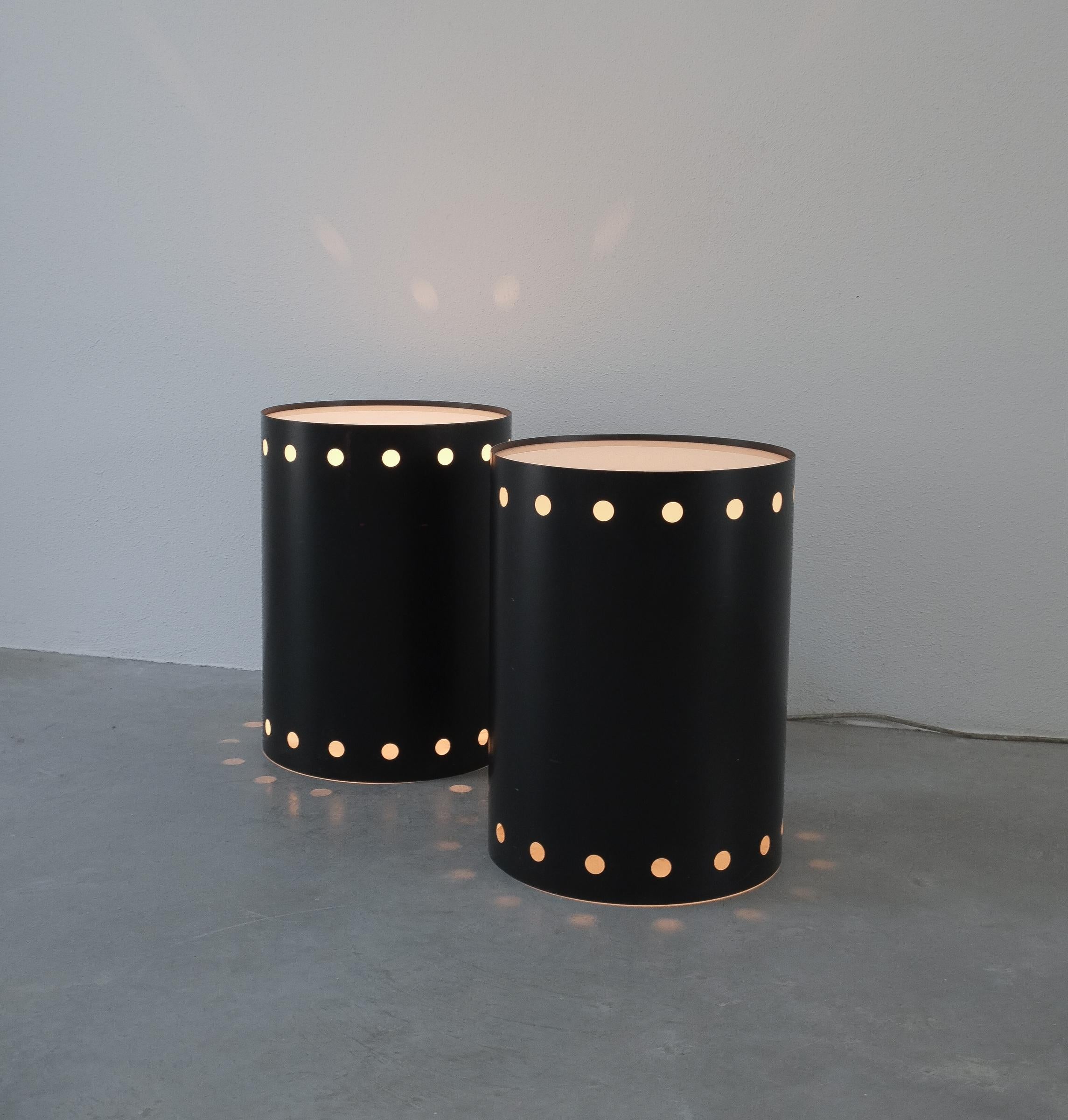 Black floor lights that will also work as bed side tables with lights, Germany circa 1965- sold as a pair

Very rare and large tubular blackened steel side tables or floor lamps that work with dimmable lamps. Stunning 1960 design made from steel