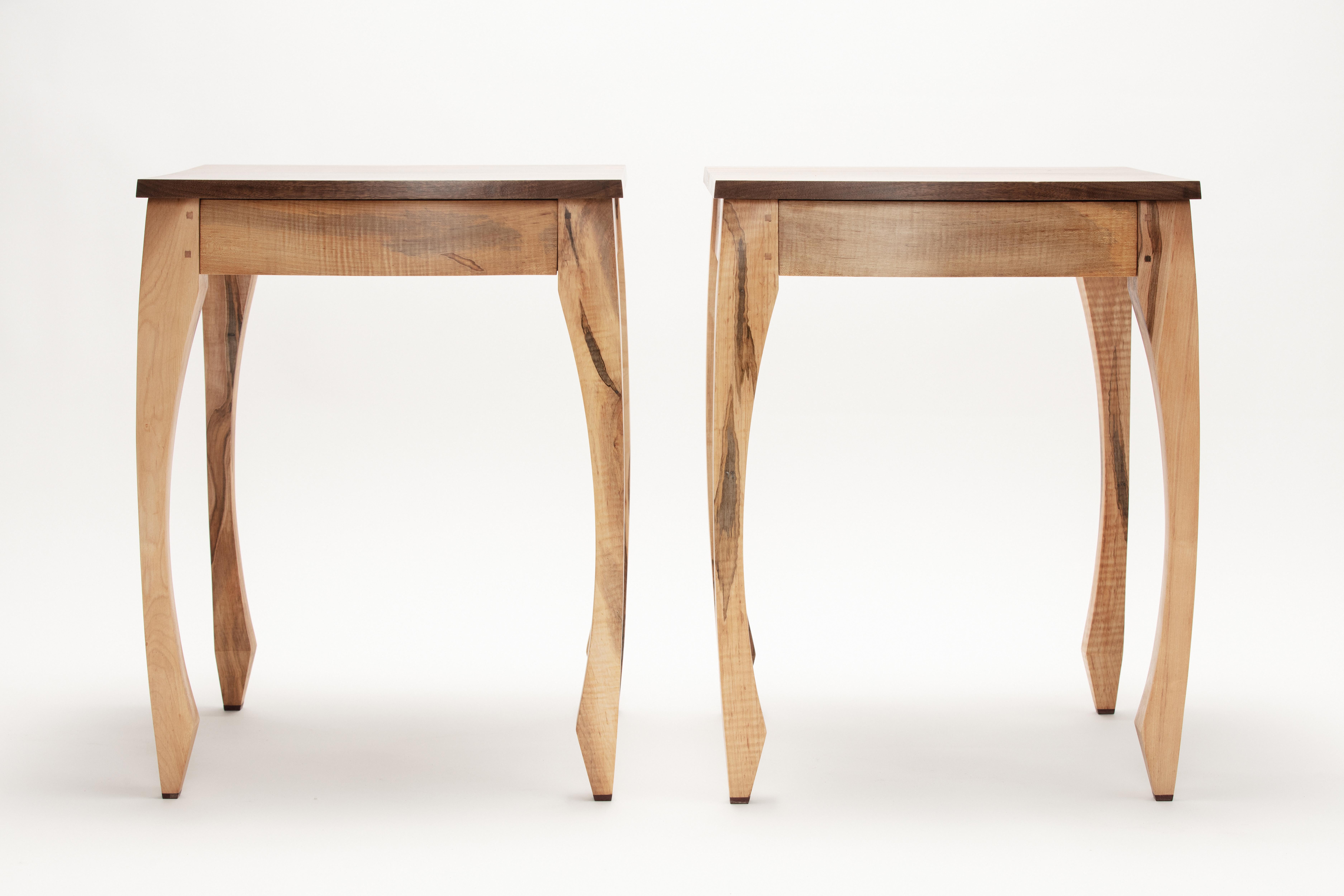 This one of a kind pair of BedSideTables were hand crafted from Curly Maple Ambrosia and richly grained Black Walnut.  The design sweeps upward from the 