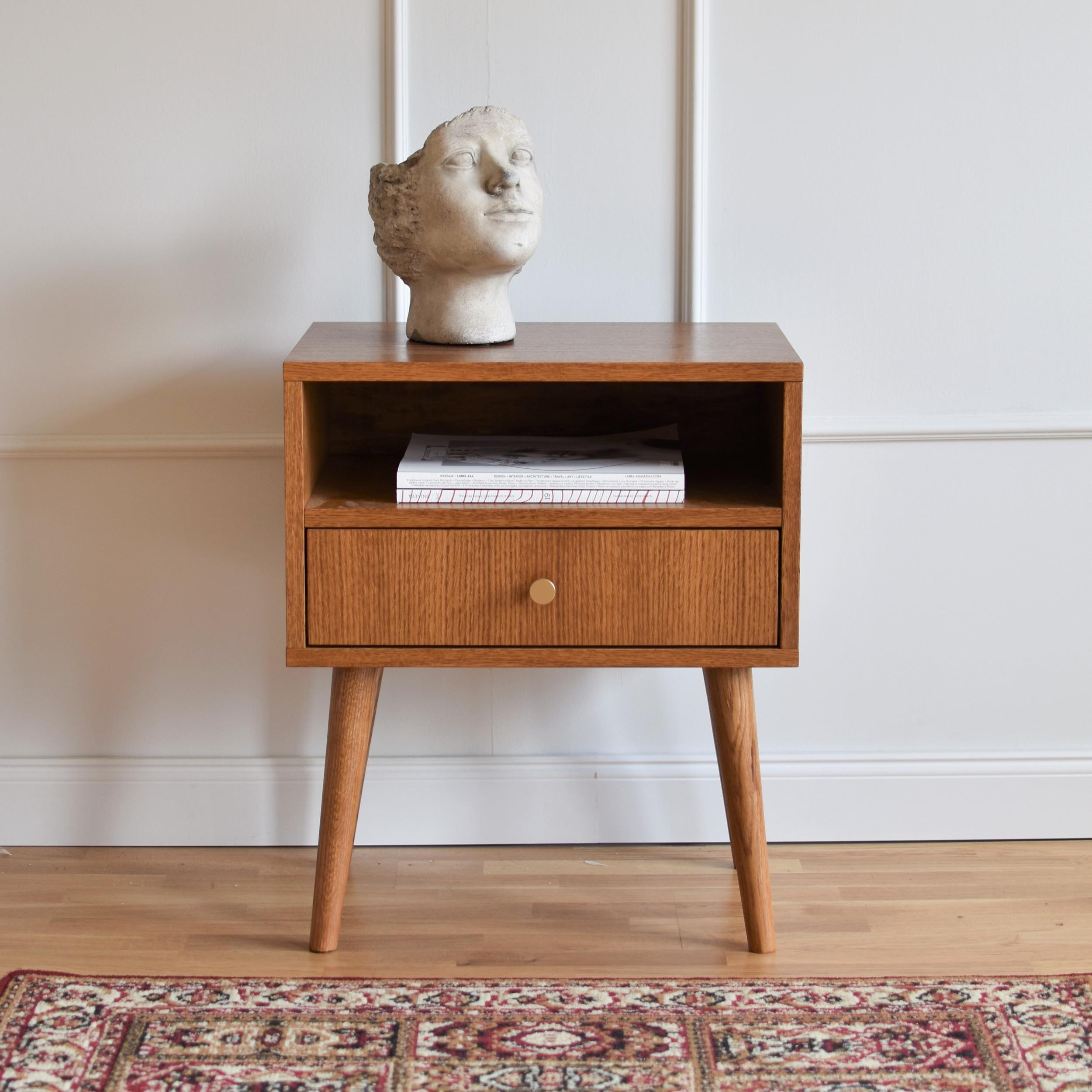 Bedie Nan Bedstand by Pastform
Dimensions: D 35 x W 45 x H 60 cm
Materials: Stained and varnished wood.

Available in different wood color finishes: Whiskey, Rum, BPA, Nobel, Brandy, Schwarz, and Natura. Please contact us.

Bedie bedside cabinet