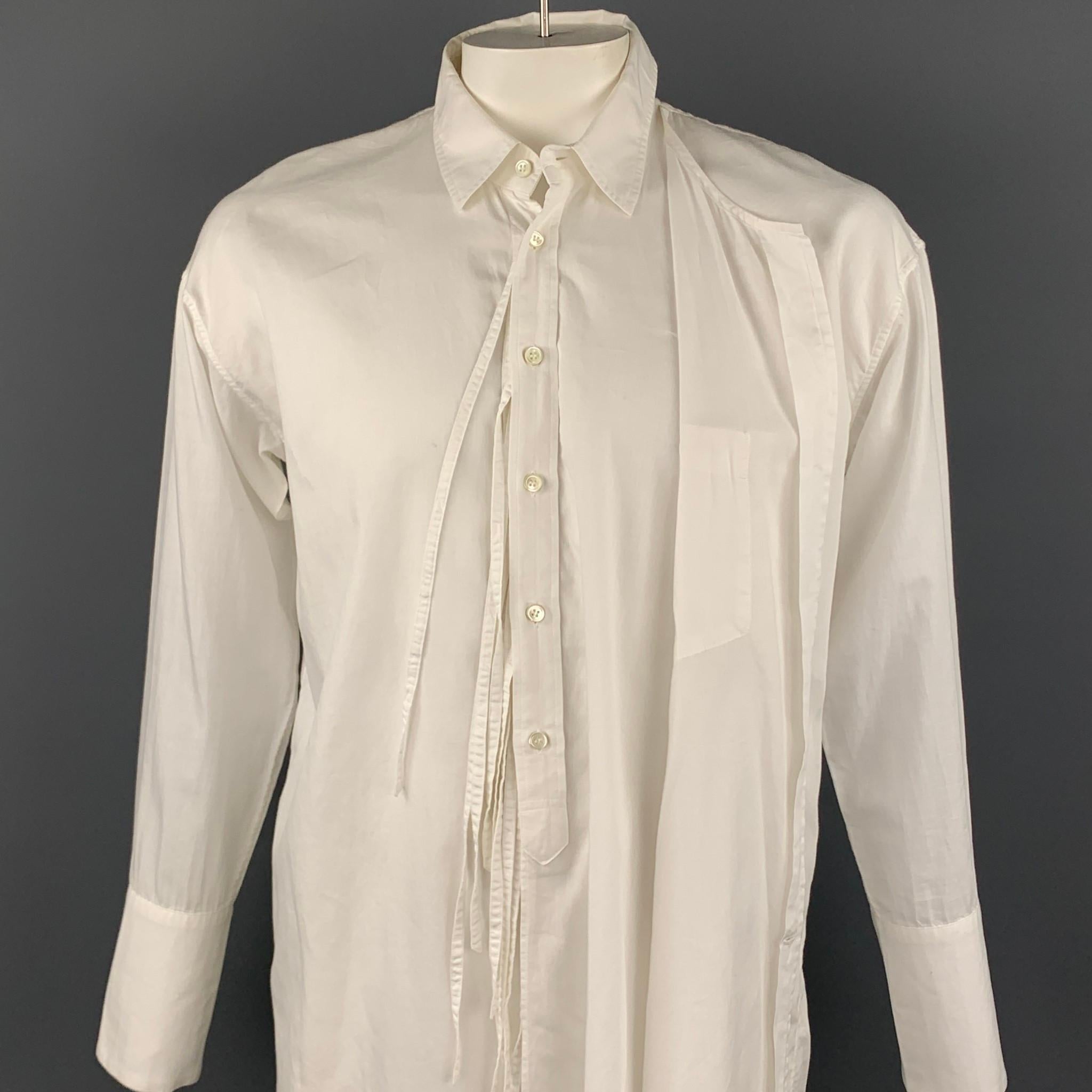 BED j.w. FORD long sleeve shirt comes in a white cotton / silk featuring a button up style, asymmetrical design, strap details, front panel, patch pocket, and a spread collar. Made in Japan.

Good Pre-Owned Condition.
Marked: JP