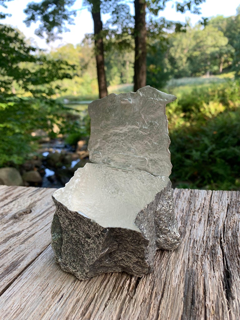 Michele Oka Doner
Bedrock, 2019
Sterling silver box
Measures: 3 x 3 x 3 inches
Edition of 10
Signed and numbered

Artist statement:
Bedrock was created in response to the glass house. Though both share a minimal structure, the House