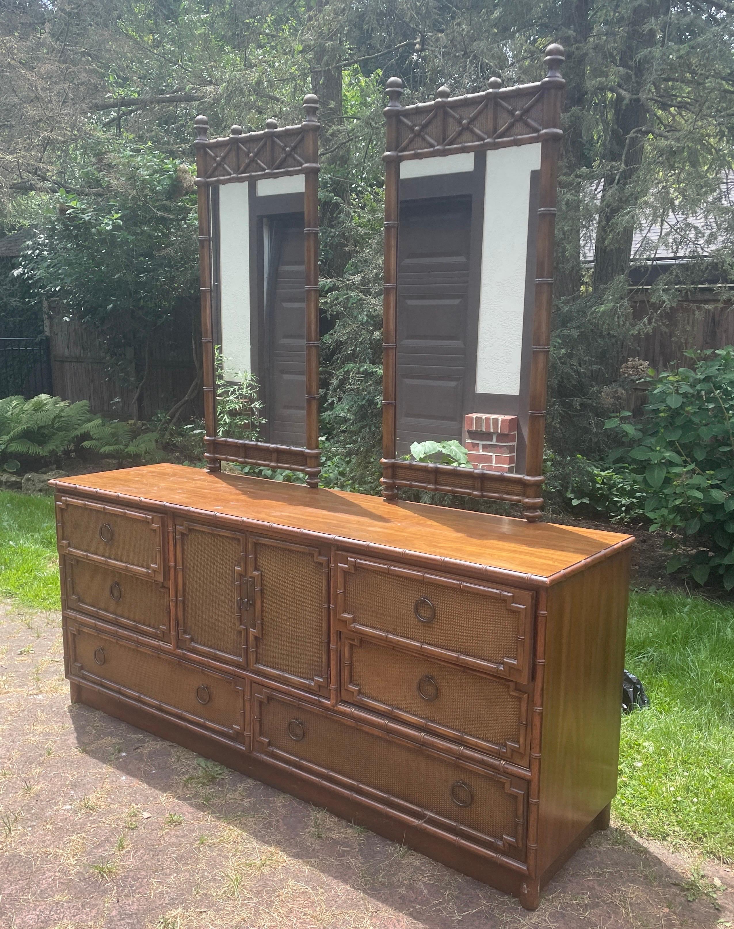 This piece is in stunning vintage condition. Rattan and faux bamboo design are classic and the workmanship that went into this piece is awe inspiring. Please see other listings for additional parts of this set: highboy dresser.

Gorgeous vintage