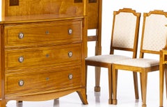 Bedroom furniture in the style of Queen Maria style, made of satinwood.