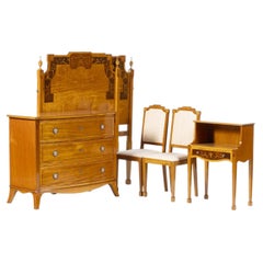 Bedroom furniture in the style of Queen Maria style, made of satinwood.