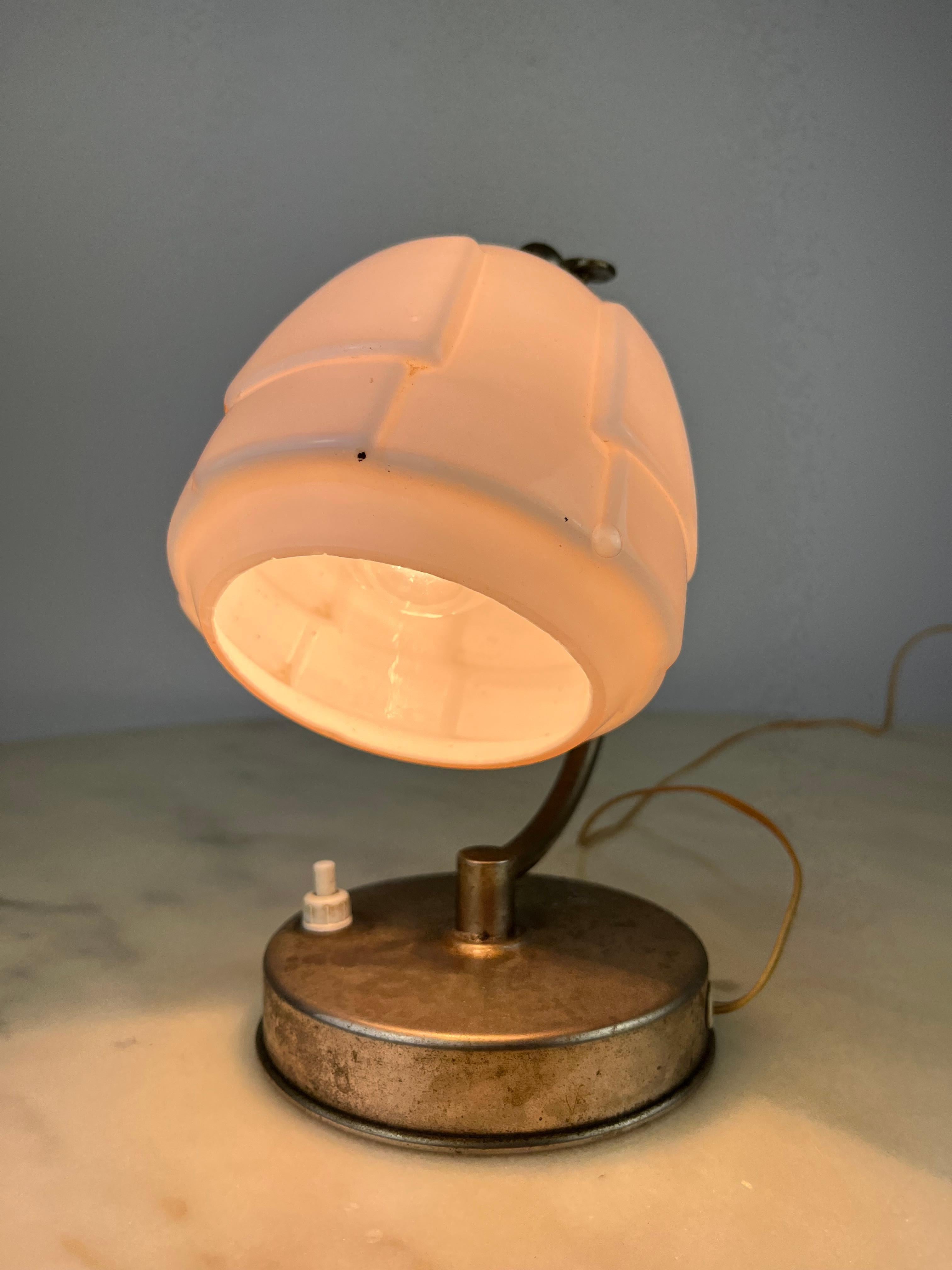Bedside lamp in metal and glass, Italy, 1940s.
In working order, found in a noble apartment. Small signs of age and use.