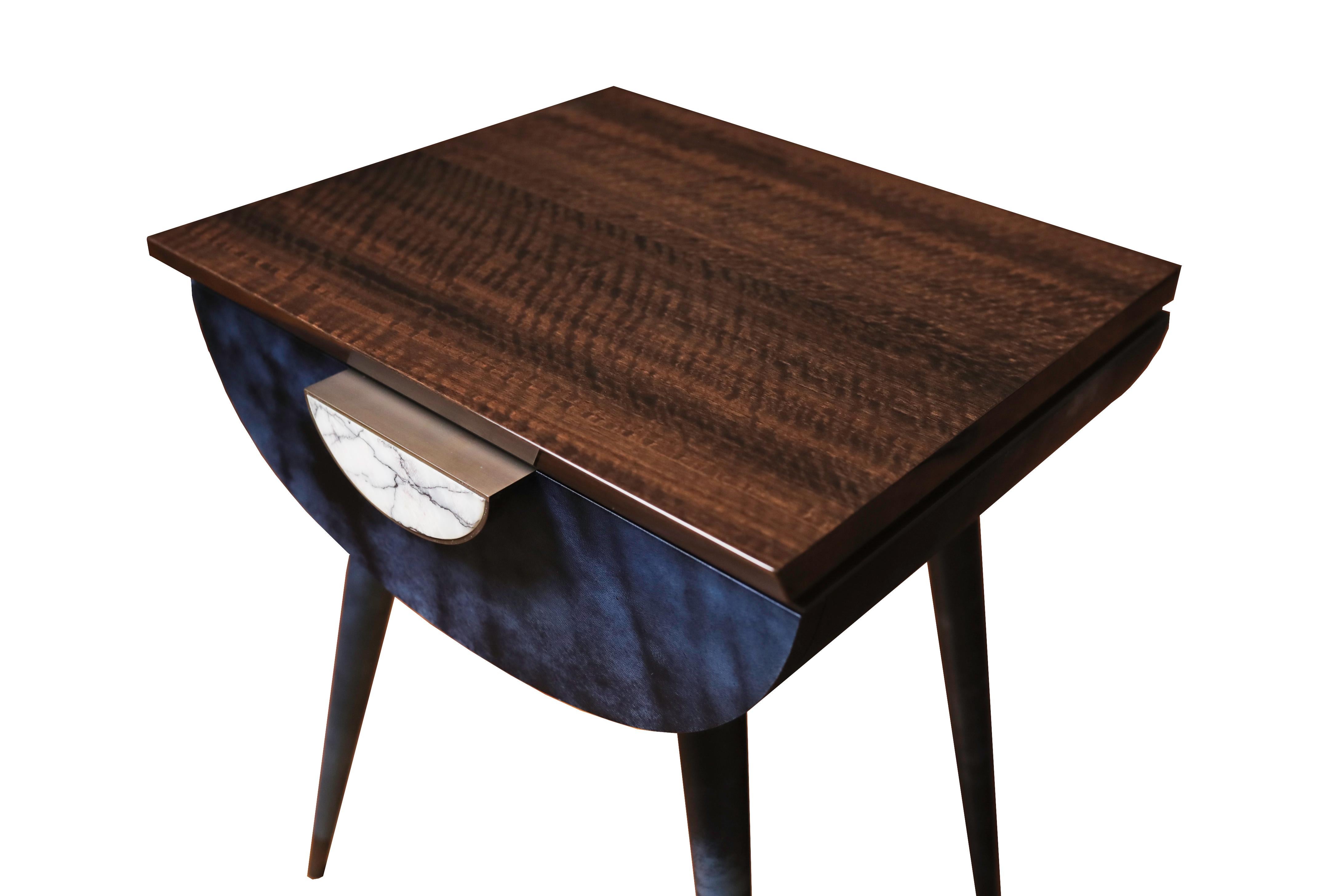 Vellum Bedside Table
For this beautiful Vellum Bedside Table, we have used hand dyed cobalt blue Vellum skins, Fumed Eucalyptus, bronzed brass and stone.  Entirely hand made by Boucher & Co, Toowoomba, Australia.
The shape is a timeless contemporary