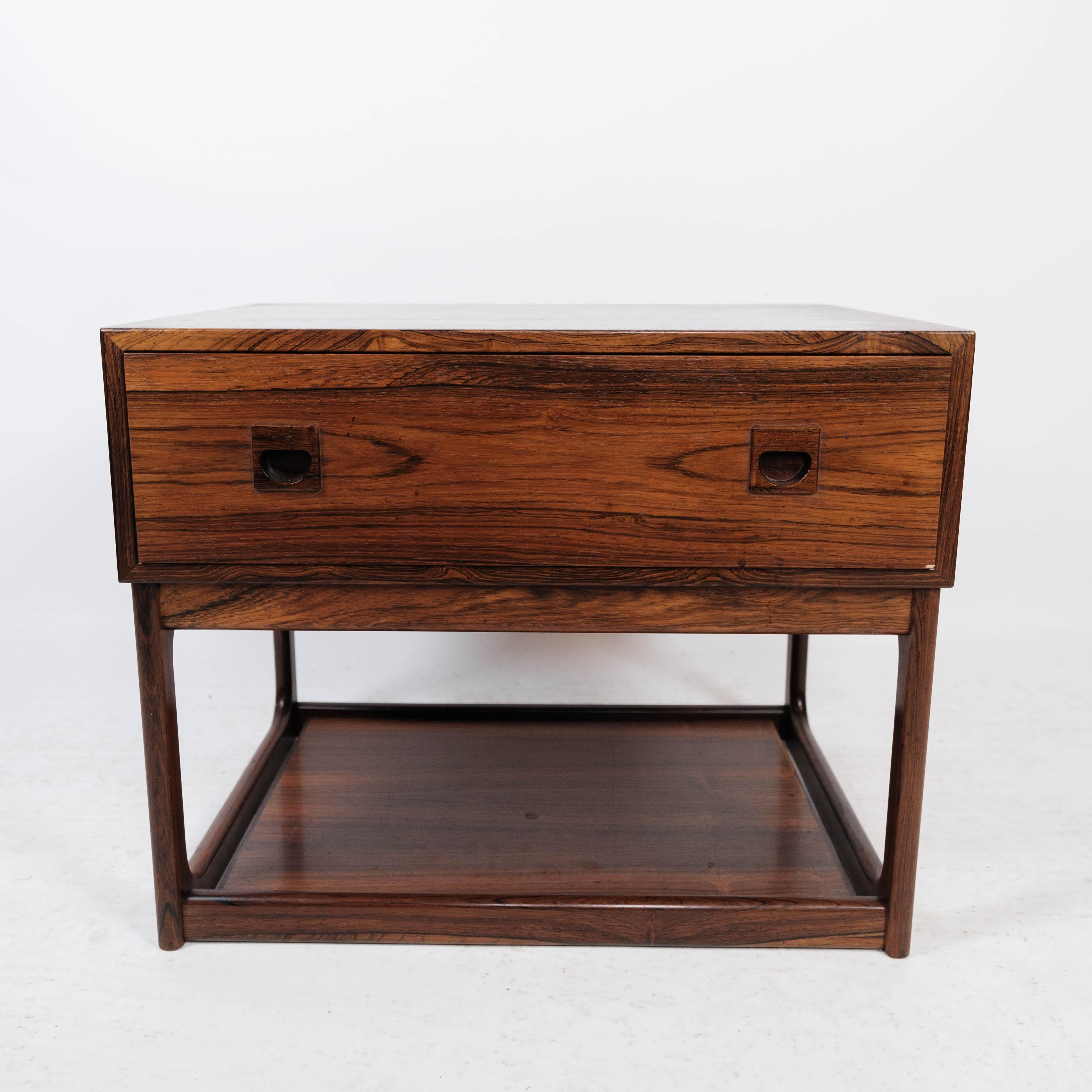 Bedside table in rosewood of Danish design manufactured by Brouer in the 1960s. The table is in great vintage condition.