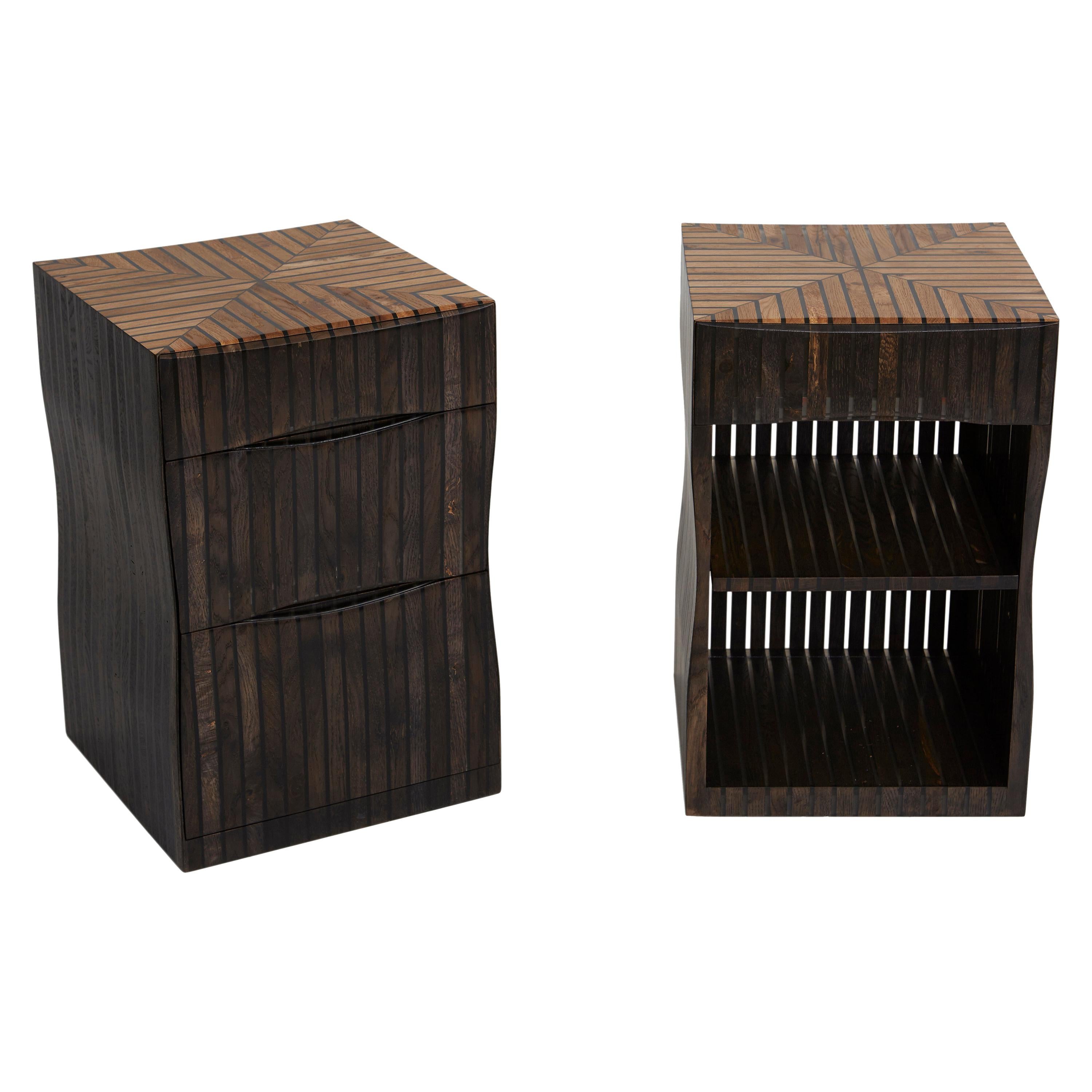 A pair of side tables in oak and clear ebony tinted resin. by Jonathan Field