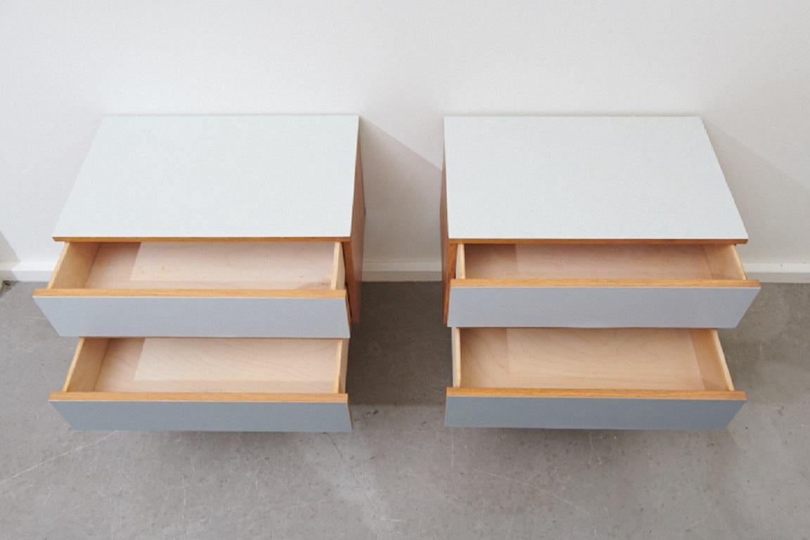 Restored: bedside tables shades, elm, 1960s, elm wood natural and lacquered in 3 shades of gray, 2 drawers per bedside table, easily dismantled, tapered legs made of solid wood

Dimensions in cm: 
Length: 50 
Width: 32 
Height: 50.