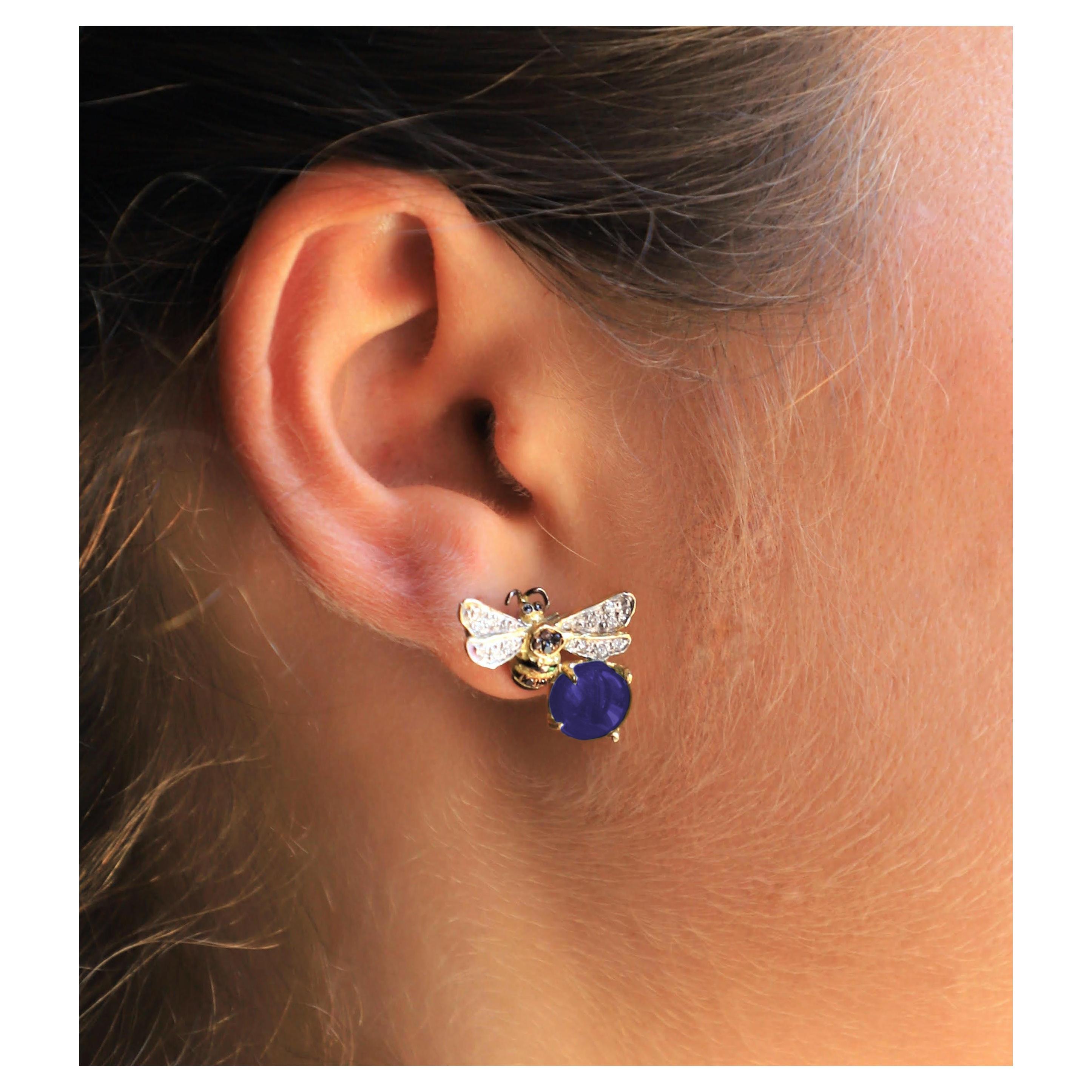Rossella Ugolini  Design Collection 18 Karat Yellow Gold Round Cut Indigo Iolite 0.16 Carat White Diamond 0.18 Carat Black Diamonds Bees Handcrafted Stud Earrings.
This collection was born to celebrate a precious creature, essential for our survival