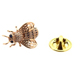 Broche abeille de classe en or rose 14 carats avec saphirs et diamants