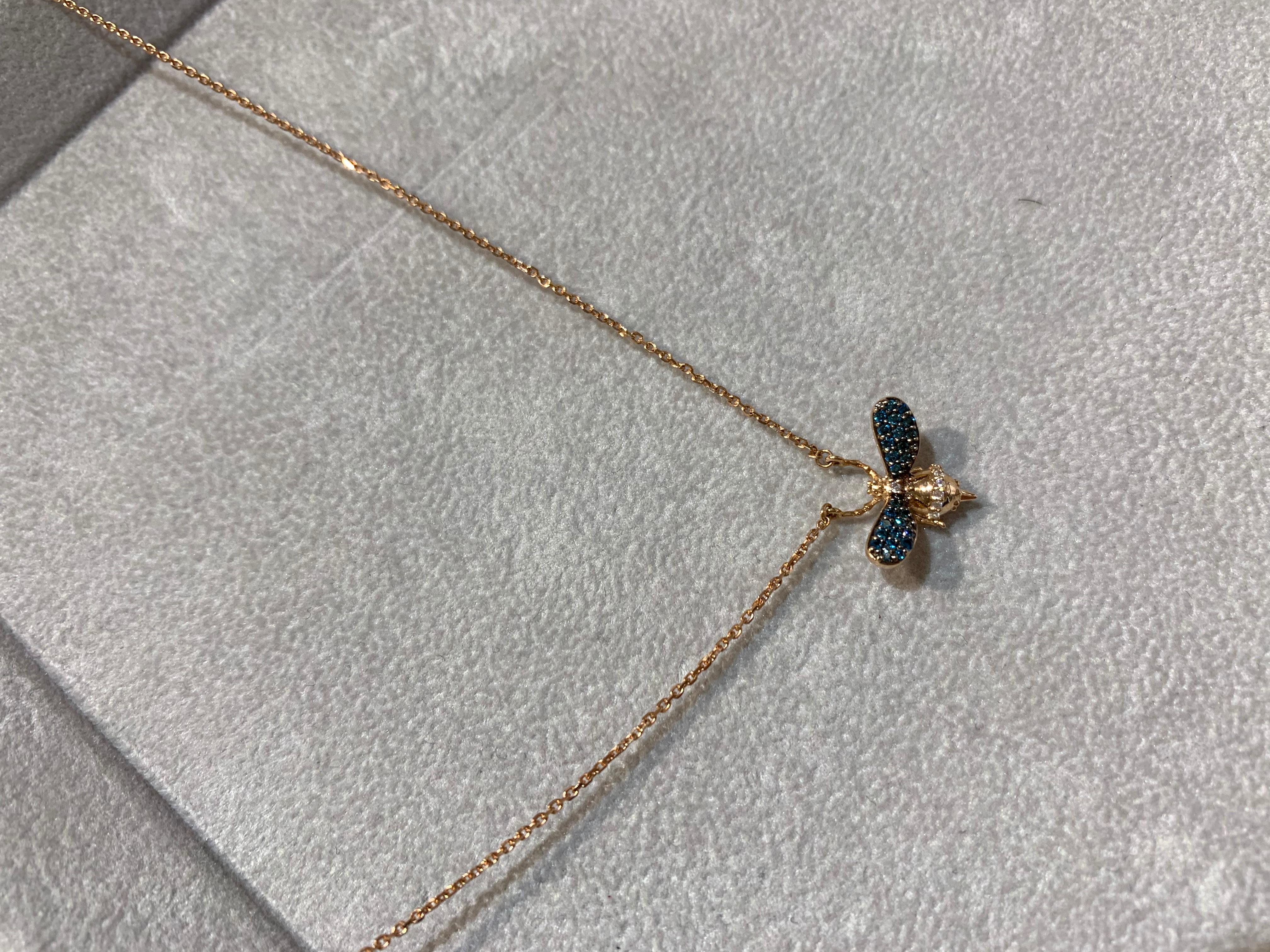 Modern Bee Goddess 14 Karat Gold, 0.04 Ct Diamond, 0.14 Carat Blue Diamond Bee Necklace For Sale