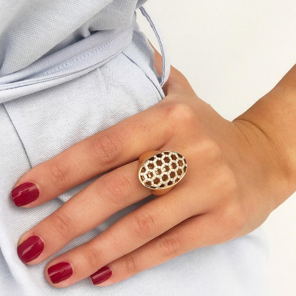 The Honeycomb Ring is a shimmering representation of how 'oneness' leads to happiness; an ode to honey making. Channelling the power of unity and the miracles of working together, it celebrates harmony and abundance in white frosted glory. 

Set in