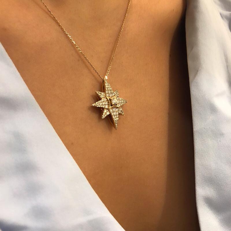 The white diamond Venus Star Necklace is a unique talisman; a stunning reminder of new beginnings, hope and inspiration. Encrusted in 1.10 carat white diamonds to showcase the infinite silvery light of the Venus Star, she is a glamorous emblem of