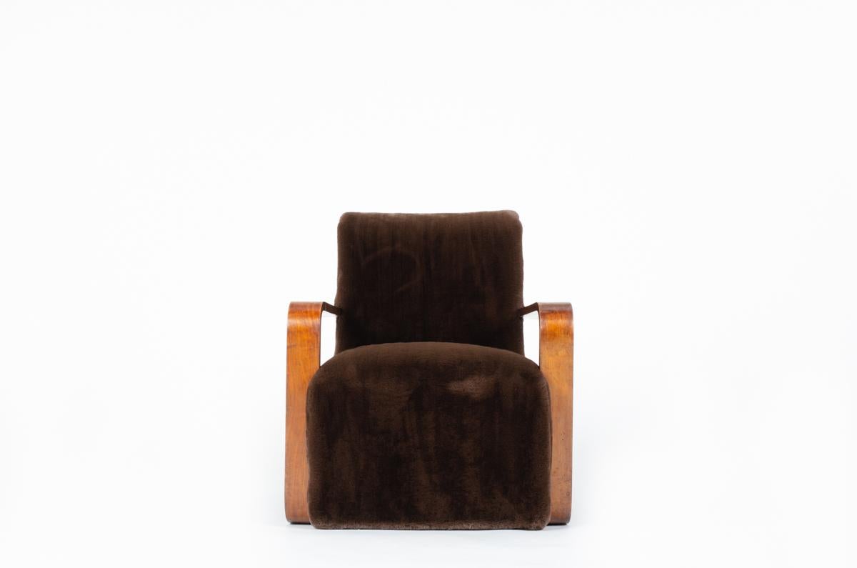 Vintage armchair with a laminate beech structure, covered by a brown fleece fabric (new)
Made in France in the 30s, during the Art Deco period
Nice patina of the wood.